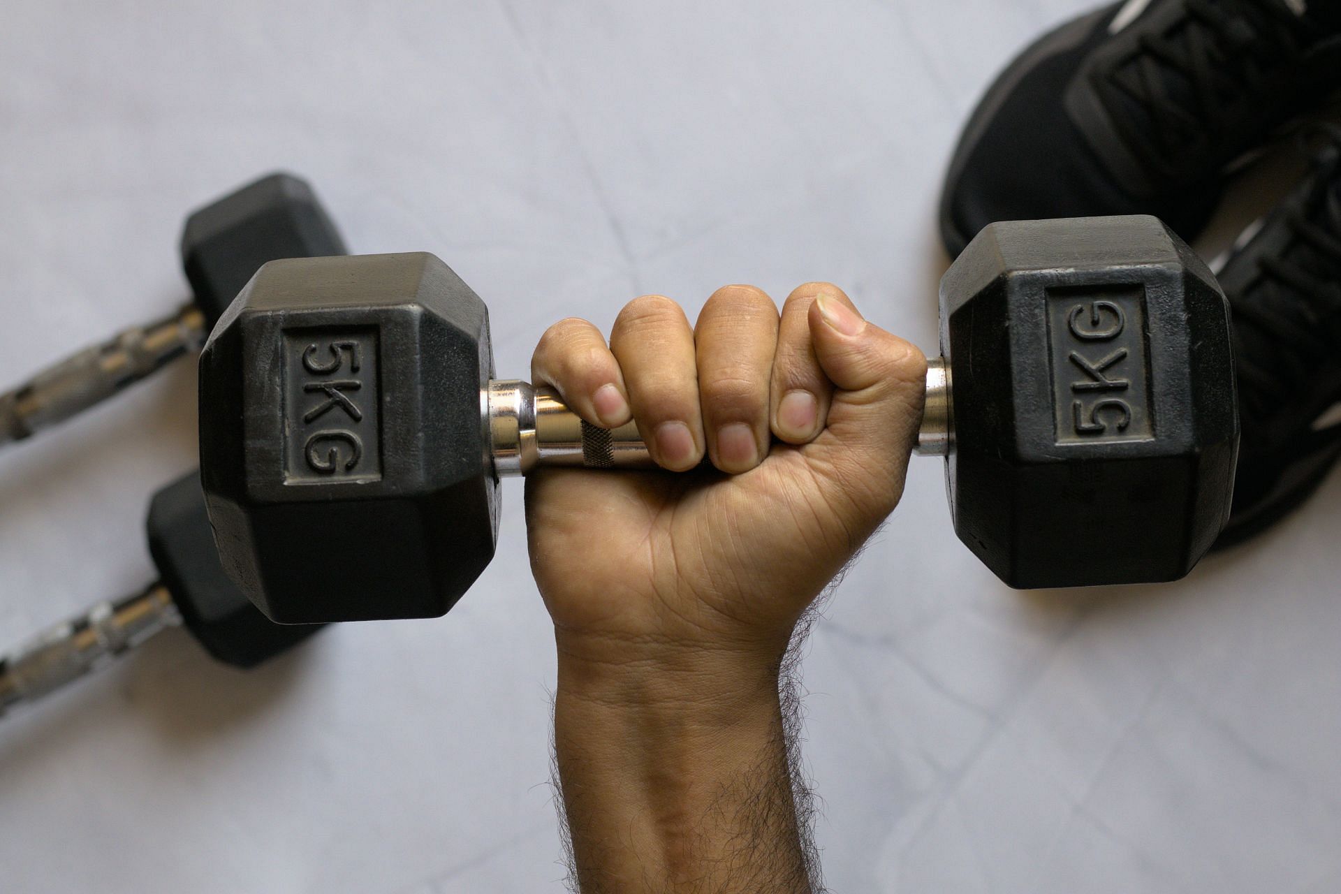Strengthen your wrists using wrist weights (Image via unsplash/VD Photography)