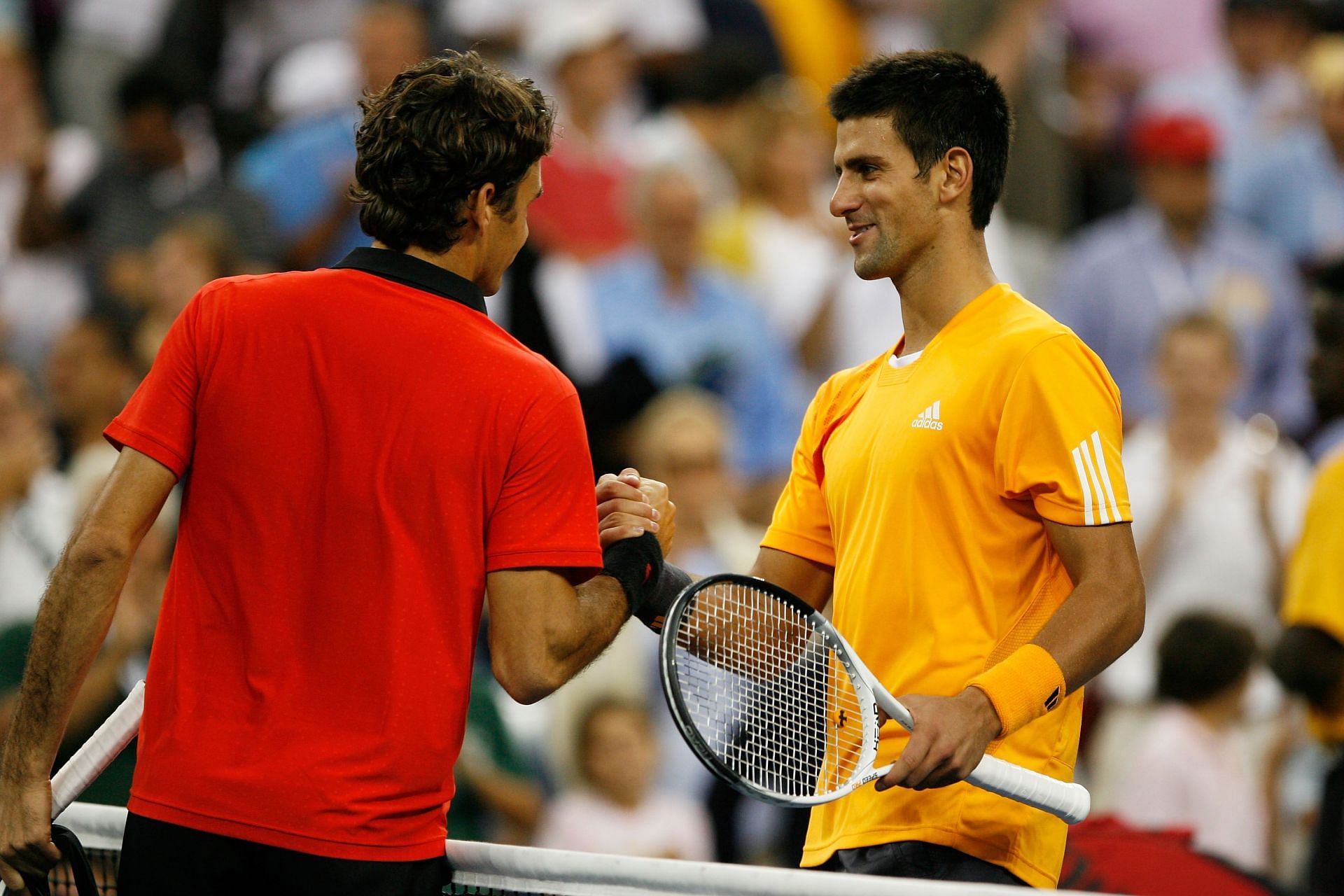 Roger Federer (left) and Novak Djokovic at the US Open in 2009