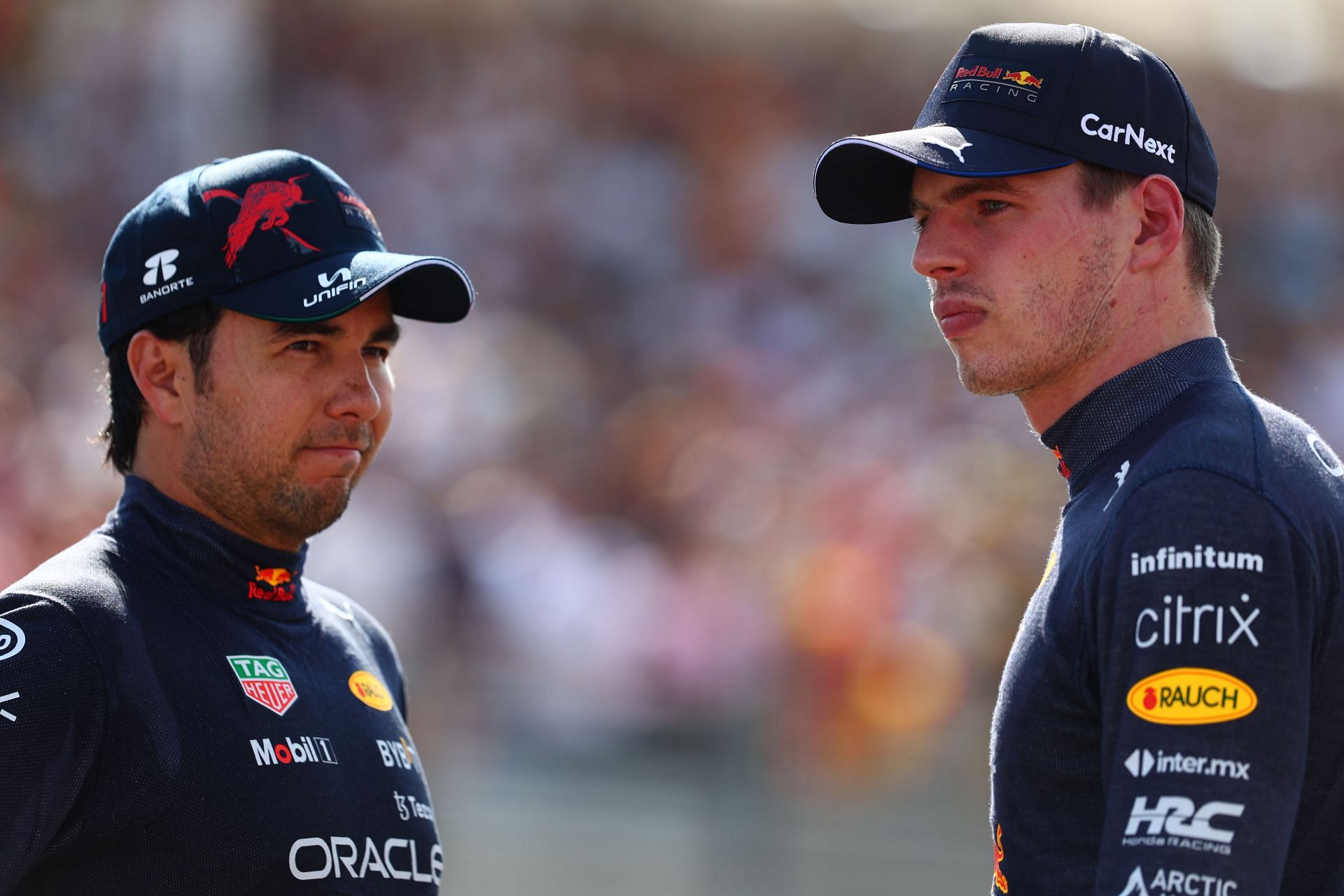 Red Bull drivers Sergio Perez (left) and Max Verstappen (right) photographed together during the 2022 F1 French GP weekend (Photo by Mark Thompson/Getty Images)