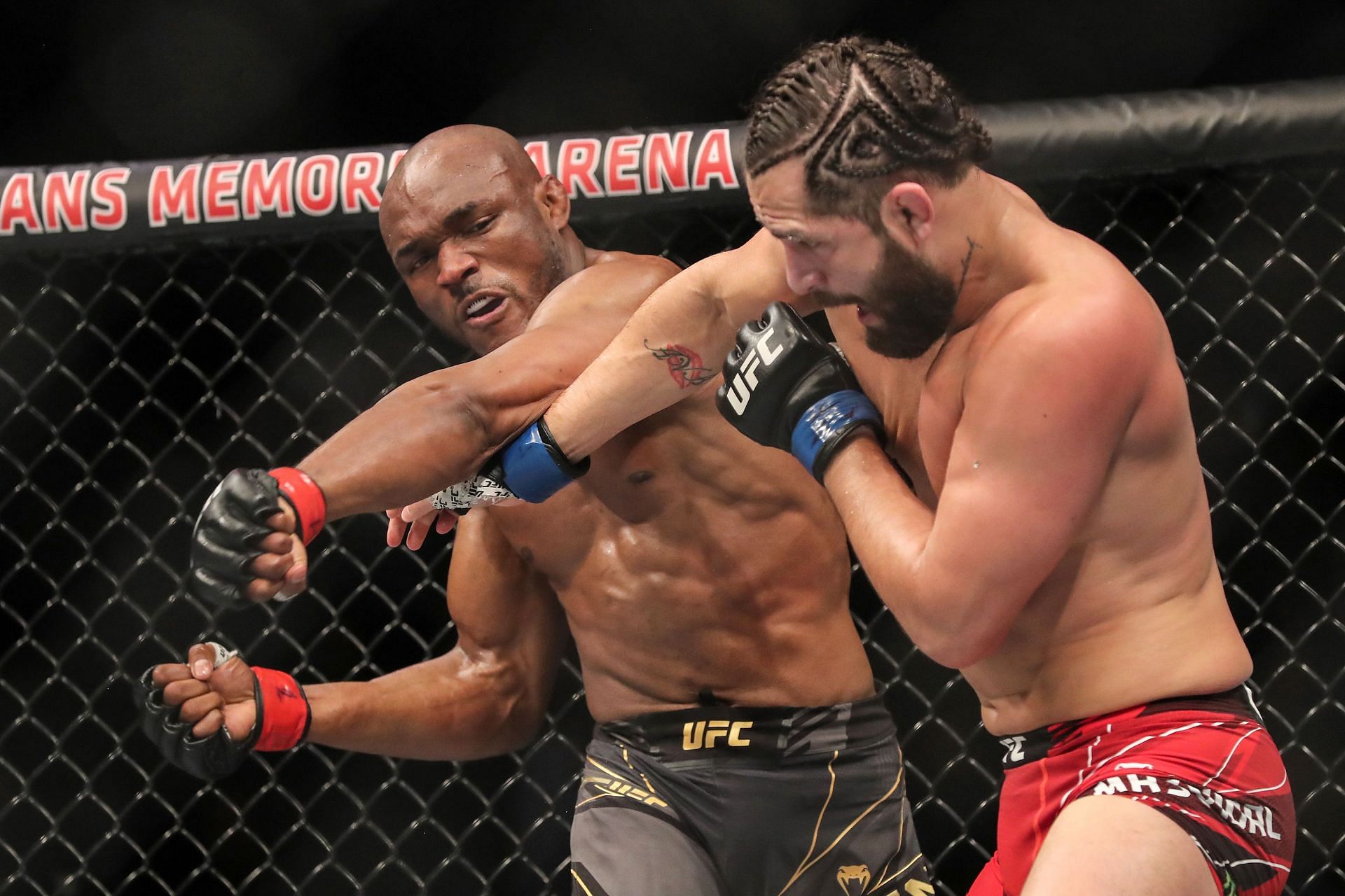 Kamaru Usman (left) and Jorge Masvidal (right) trade blows at UFC 261: Usman vs. Masvidal 2 in Jacksonville, Florida