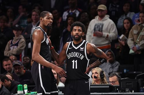 Boston Celtics v Brooklyn Nets - Game Three; Kevin Durant and Kyrie Irving react to loss