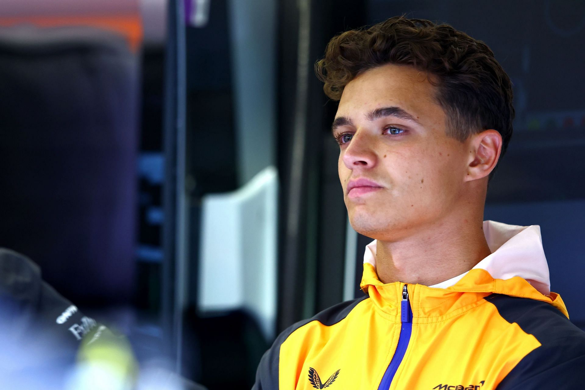 Lando Norris looks on in the garage during practice ahead of the F1 Grand Prix of Belgium at Circuit de Spa-Francorchamps on August 26, 2022 in Spa, Belgium. (Photo by Mark Thompson/Getty Images)