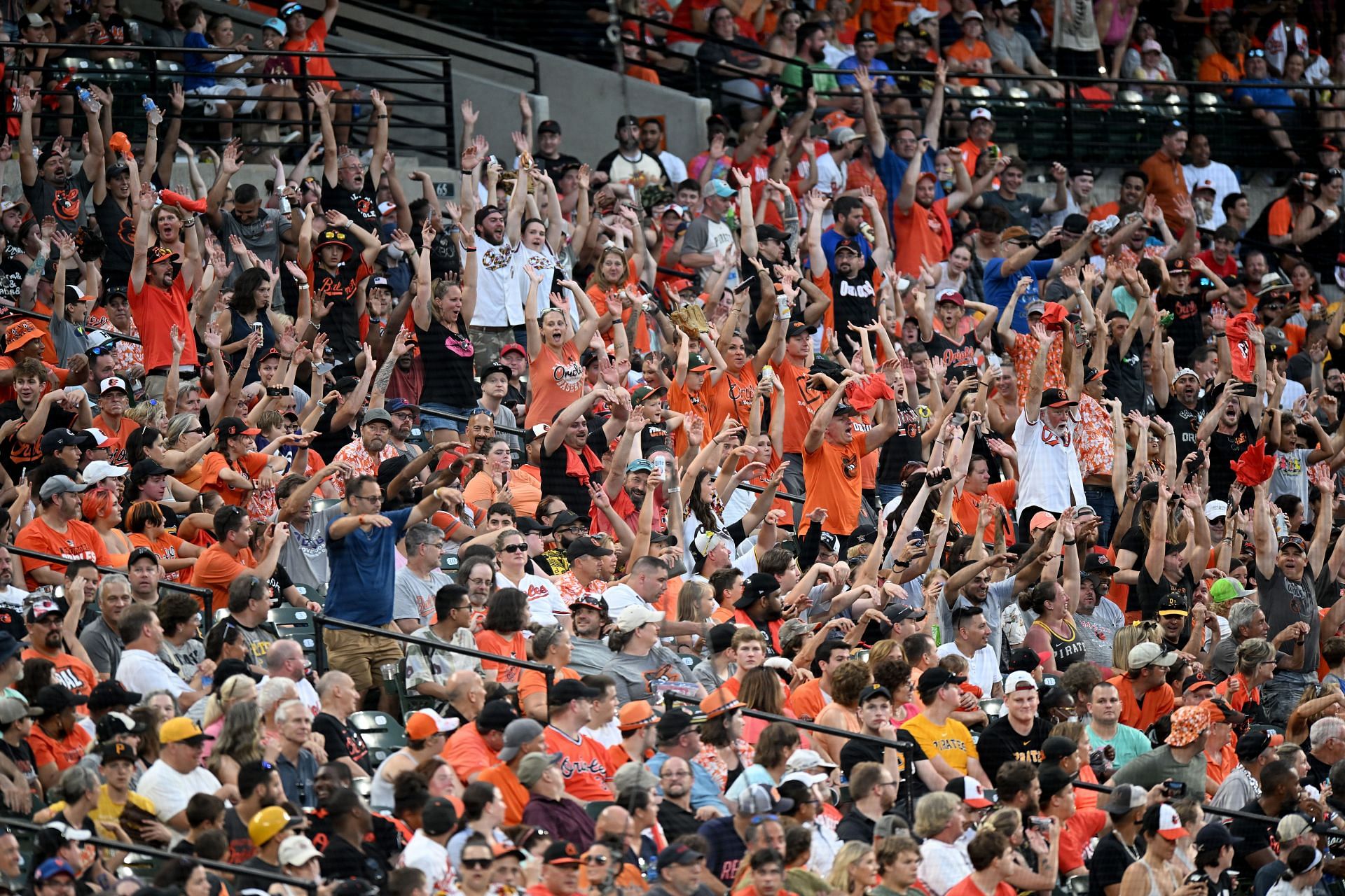 The Baltimore Orioles fans do the wave in the seventh inning at Oriole Park at Camden Yards.