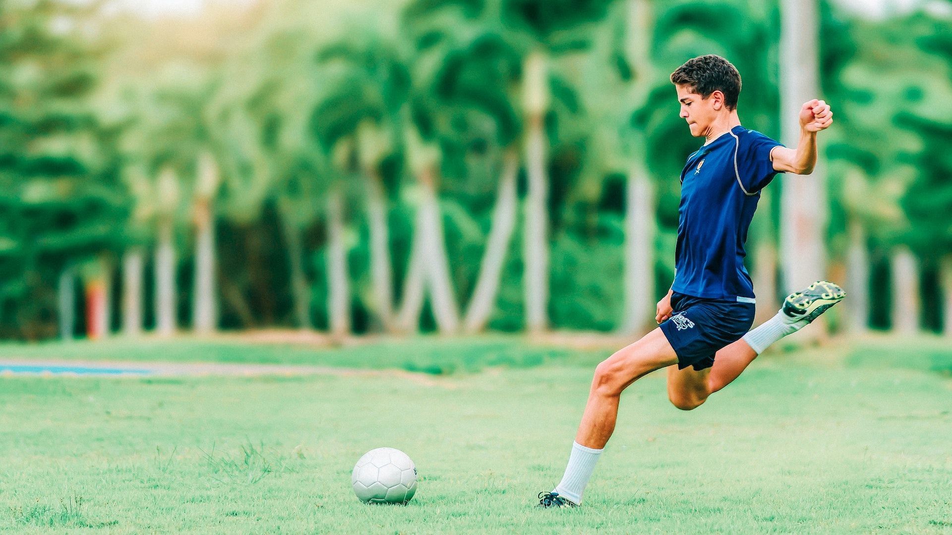 Exercises can help you become a better soccer player. (Image via Unsplash/ Kobby Mendez)