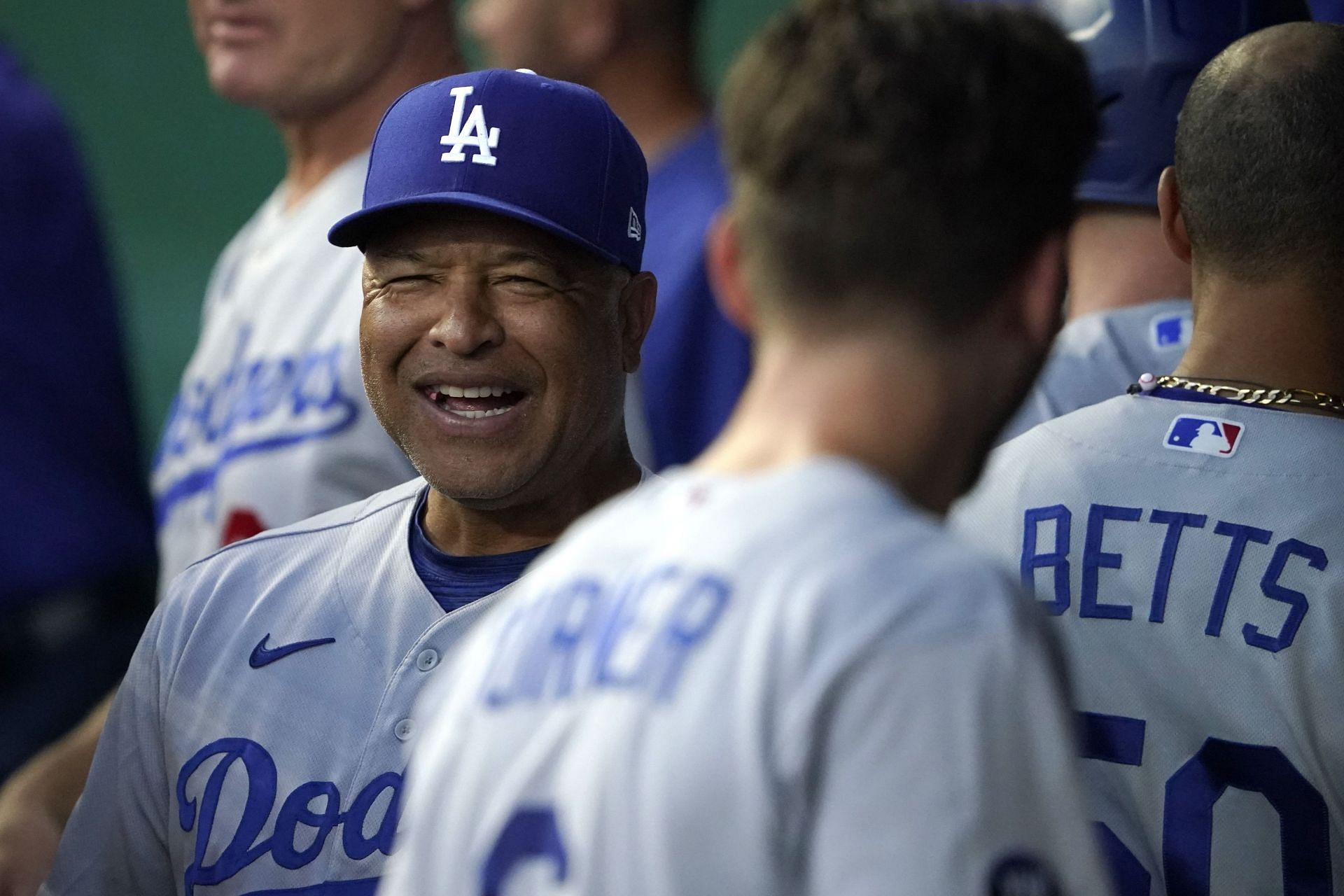 Dave Roberts smiles in the dugout during last night&#039;s Los Angeles Dodgers v Kansas City Royals game.