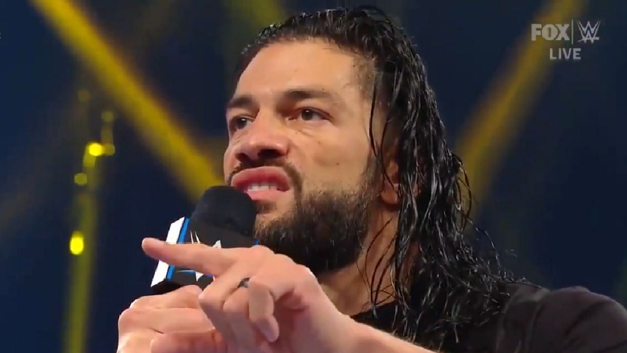 Roman Reigns cutting a promo on WWE TV.