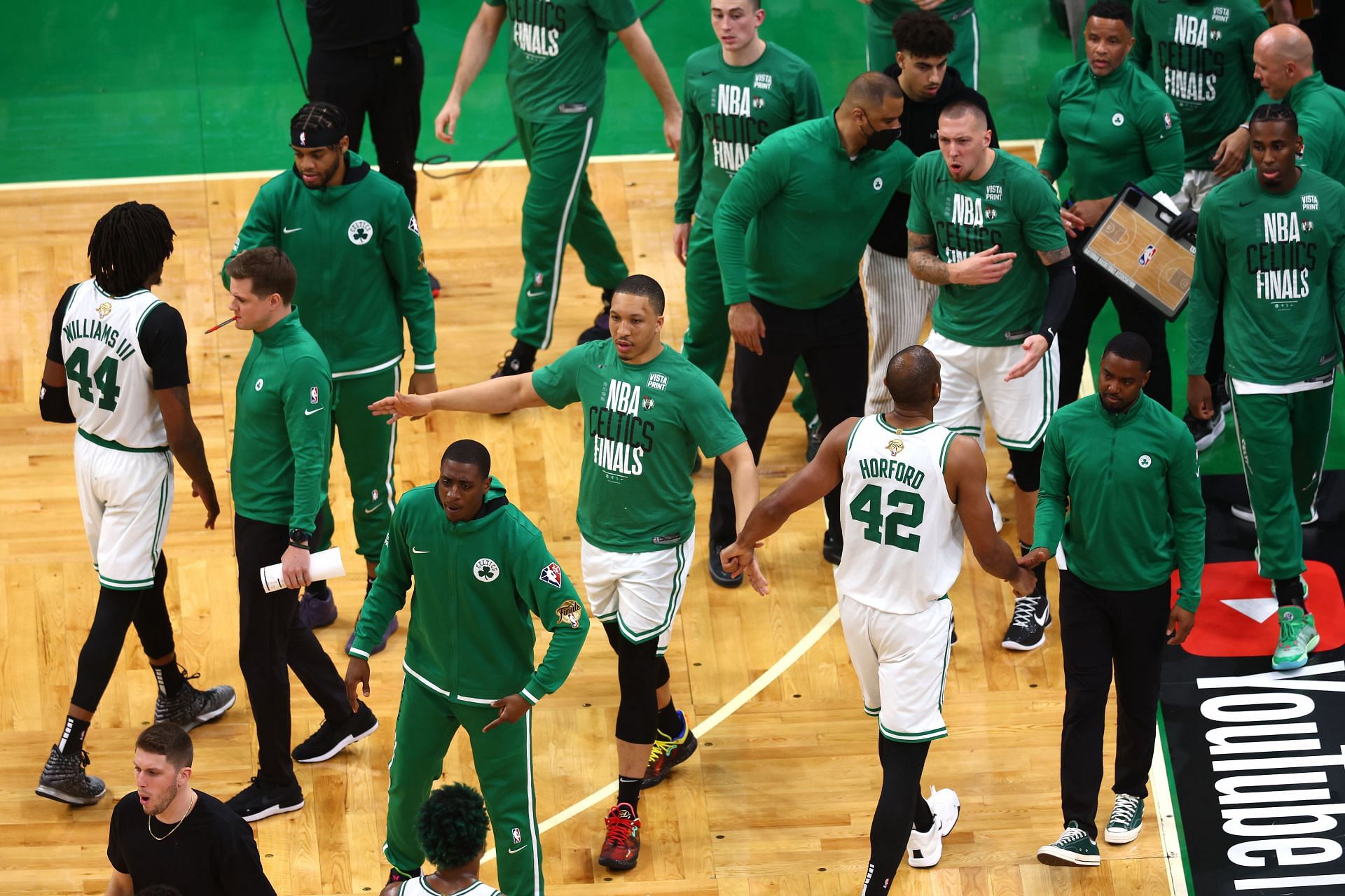 The Boston Celtics celebrate against the Golden State Warriors in Game Six of the 2022 NBA Finals