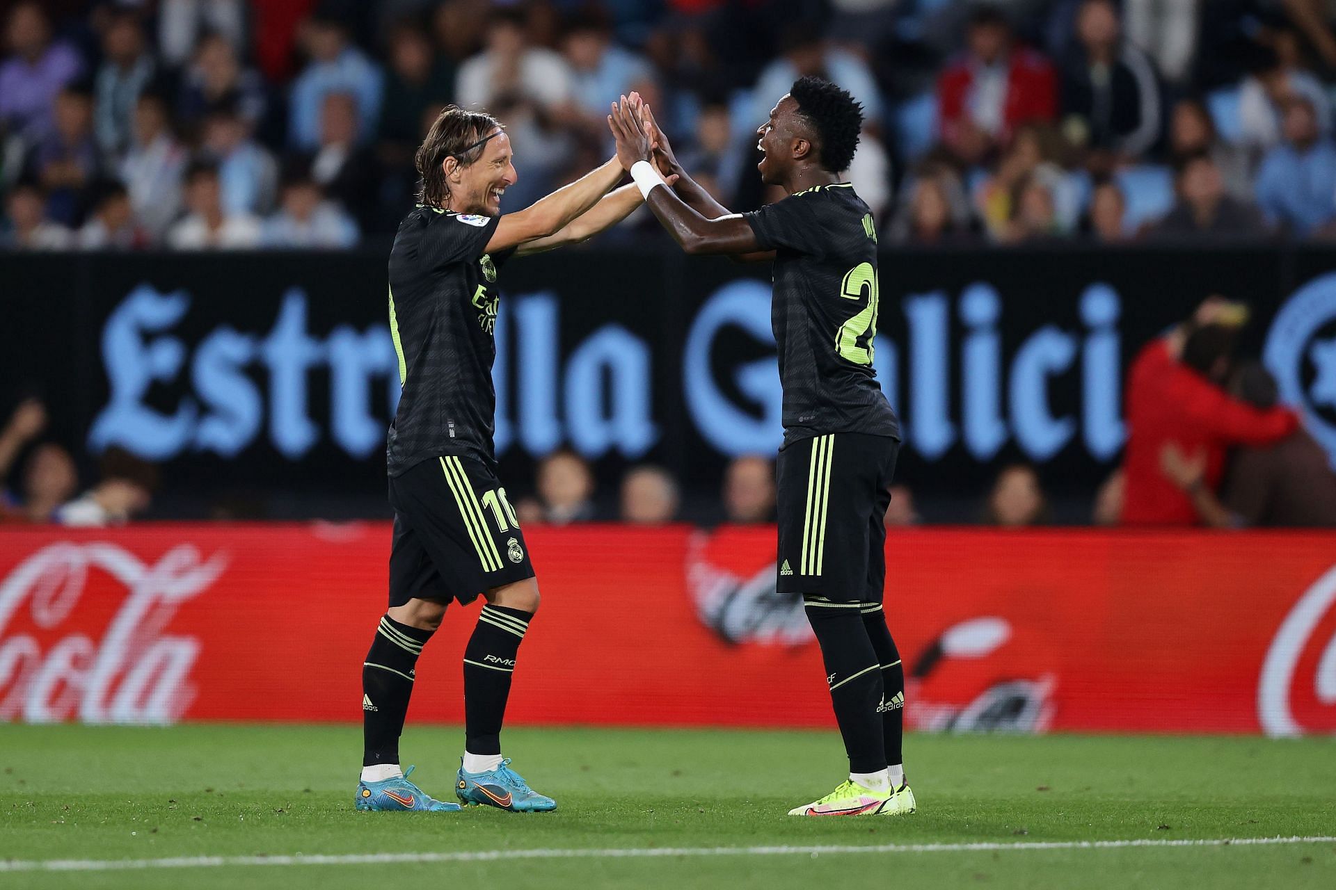 Luka Modric celebrates after scoring