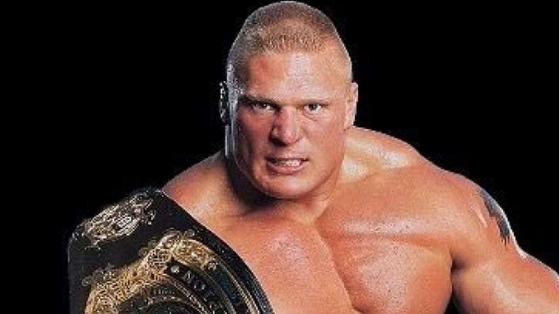Brock Lesnar with the WWE Championship in 2002