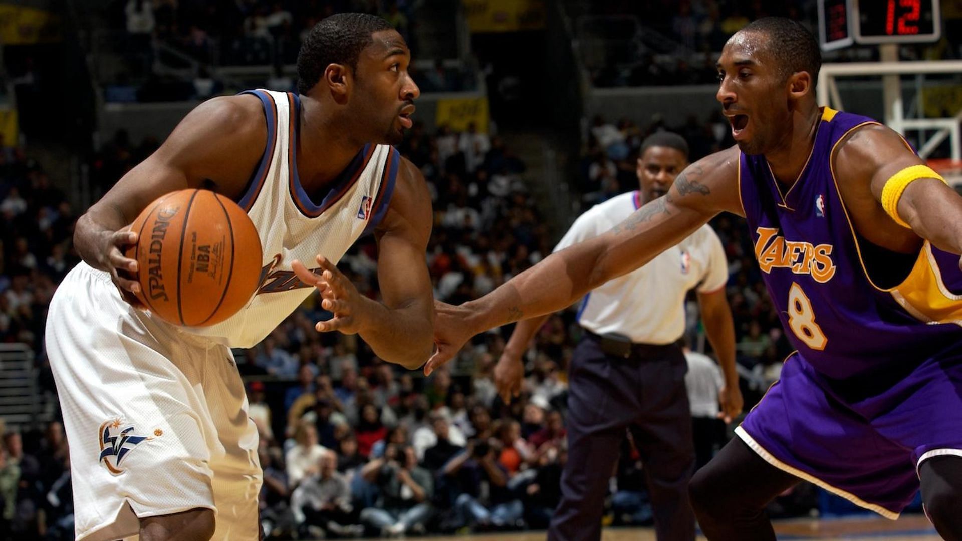 Kobe Bryant and Gilbert Arenas in action