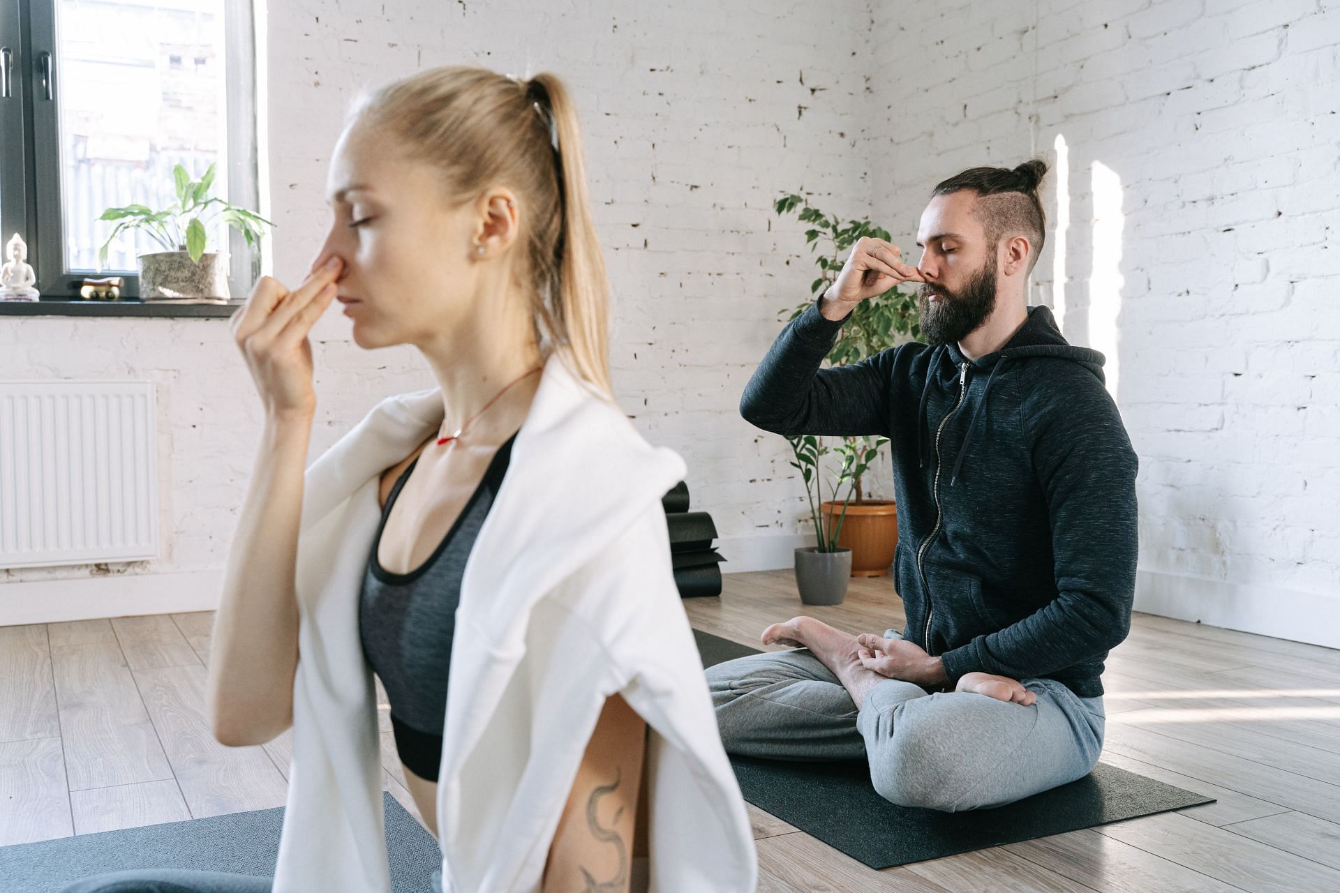 Breathing exercises are an excellent way to release stress and anxiety (Image via Pexels/ Ivan Samkov)