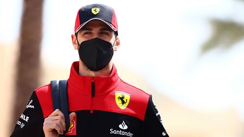 Antonio Giovinazzi walks in the Paddock during previews ahead of the F1 Grand Prix of Bahrain at Bahrain International Circuit on March 17, 2022 (Photo by Mark Thompson/Getty Images)