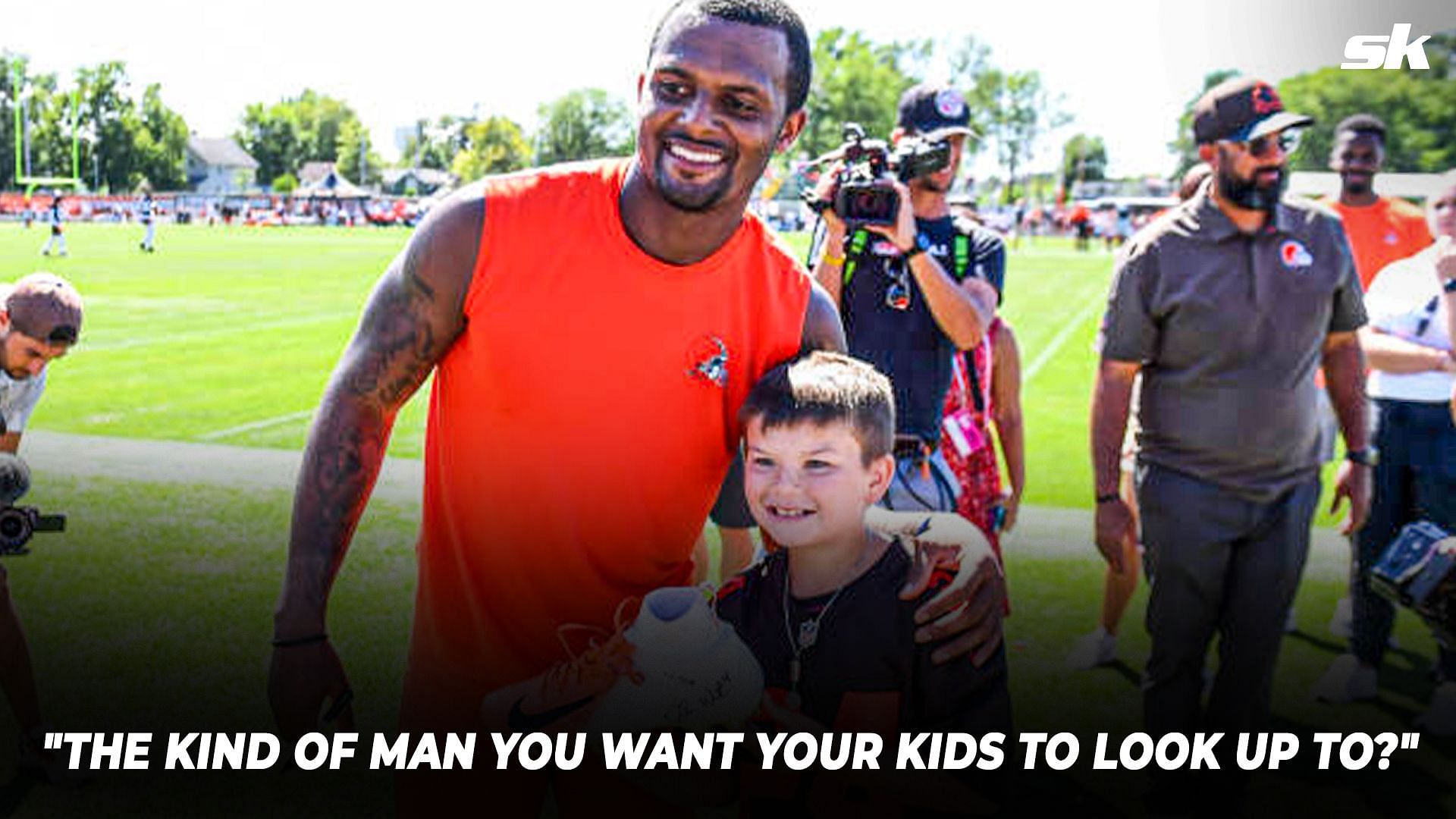 Analyst questions Browns fans taking photos with Deshaun Watson