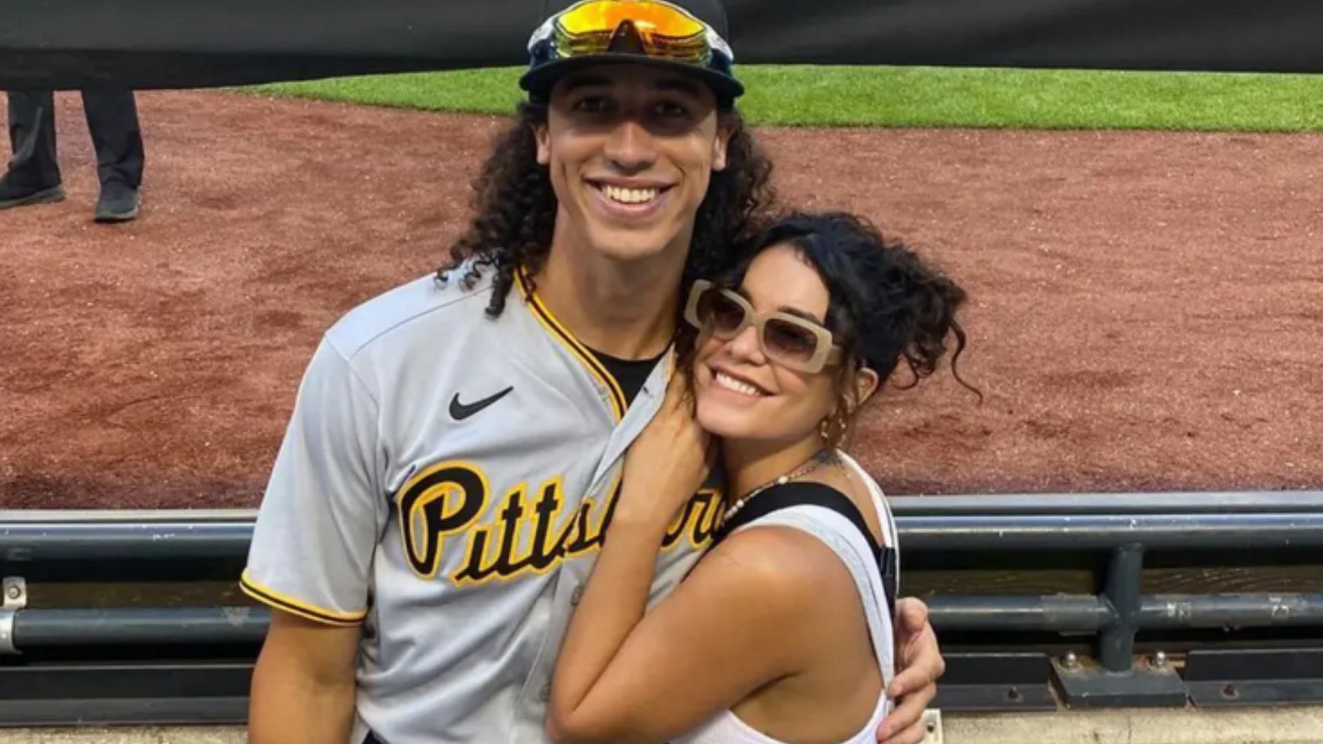 Hudgens and Tucker at a baseball game