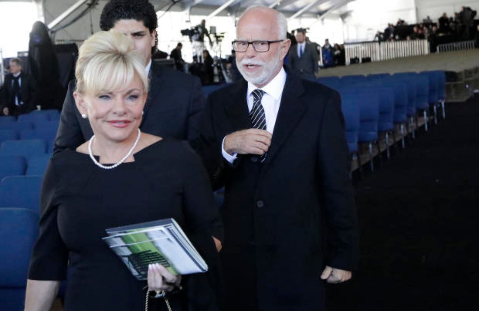 Jim Bakker and his wife Lori Bakker (Photo by Chuck Burton/AP via CBS News)