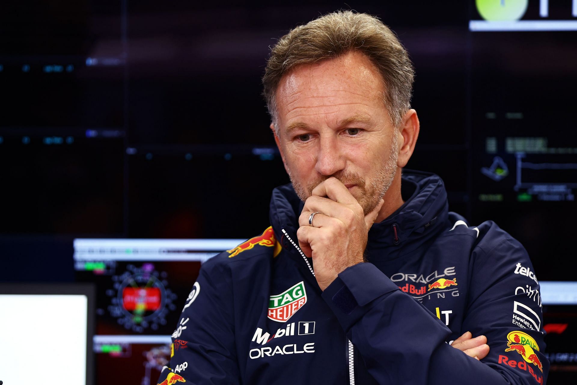 Red Bull team principal Christian Horner looks on in the paddock during the 2022 F1 Hungarian GP weekend. (Photo by Mark Thompson/Getty Images)