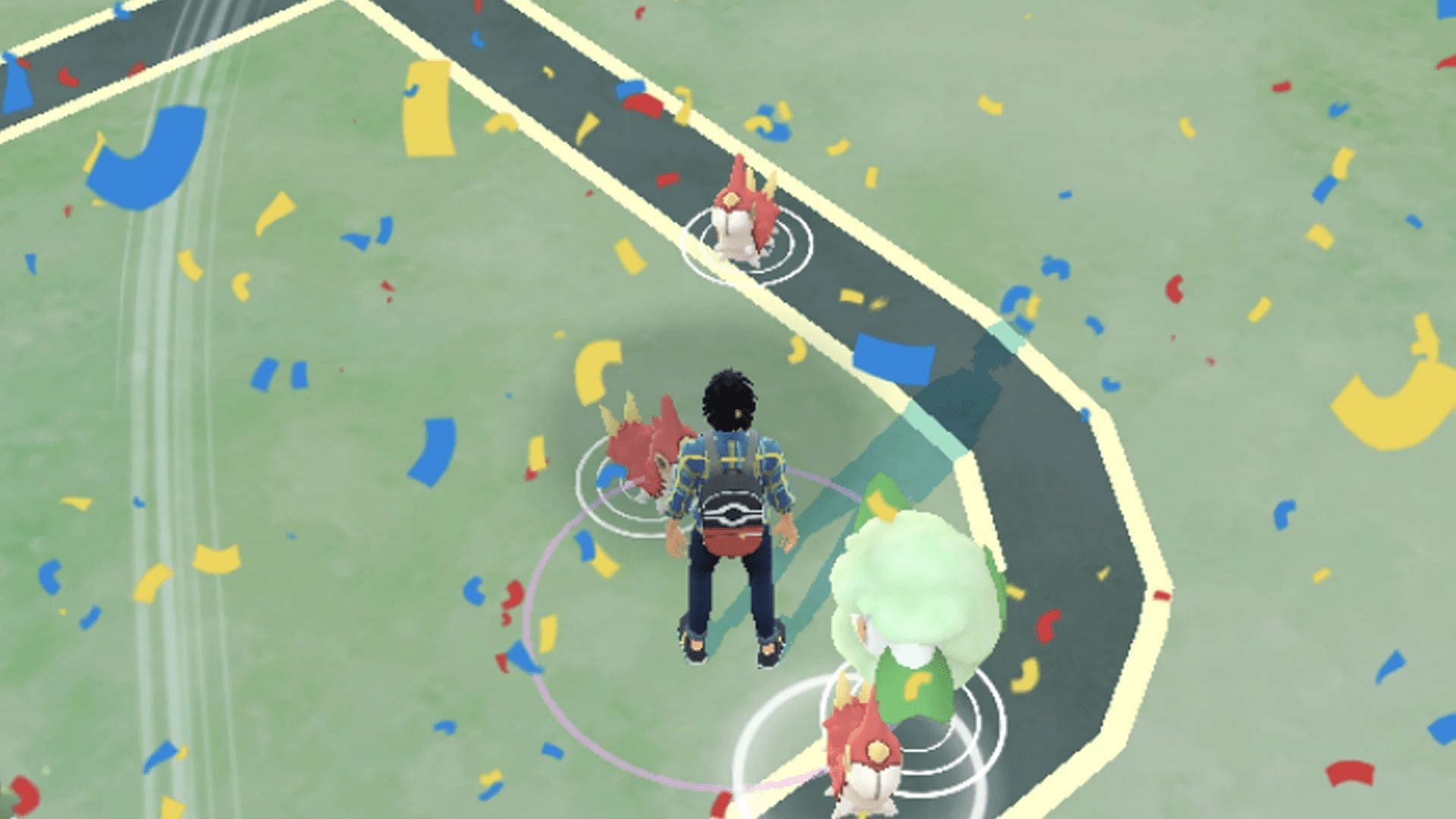 Confetti rains down on a Pokemon GO trainer (Image via Niantic)