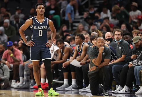 Bronny James looks on at a game.