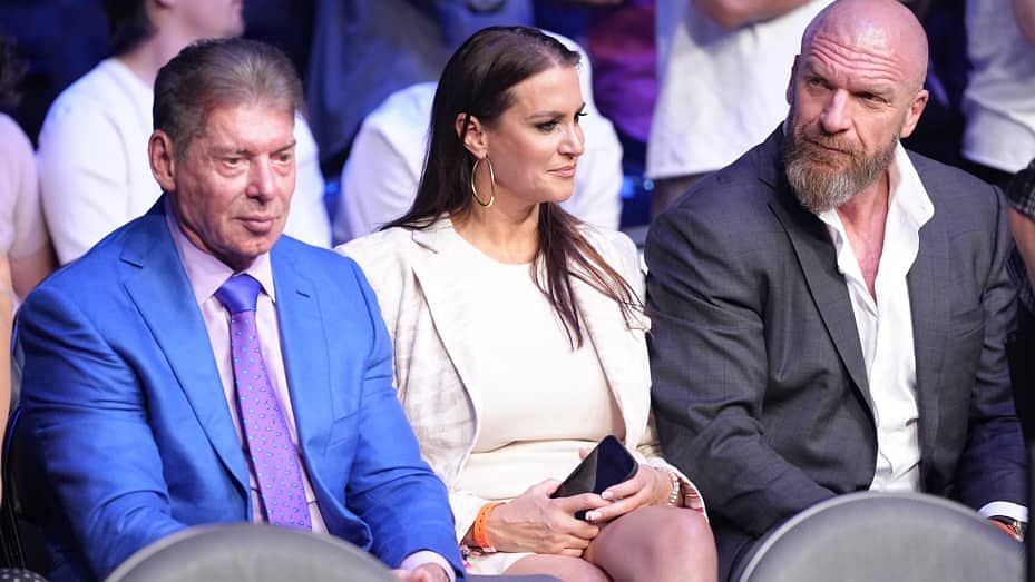 Vince and Stephanie McMahon, alongside Triple H