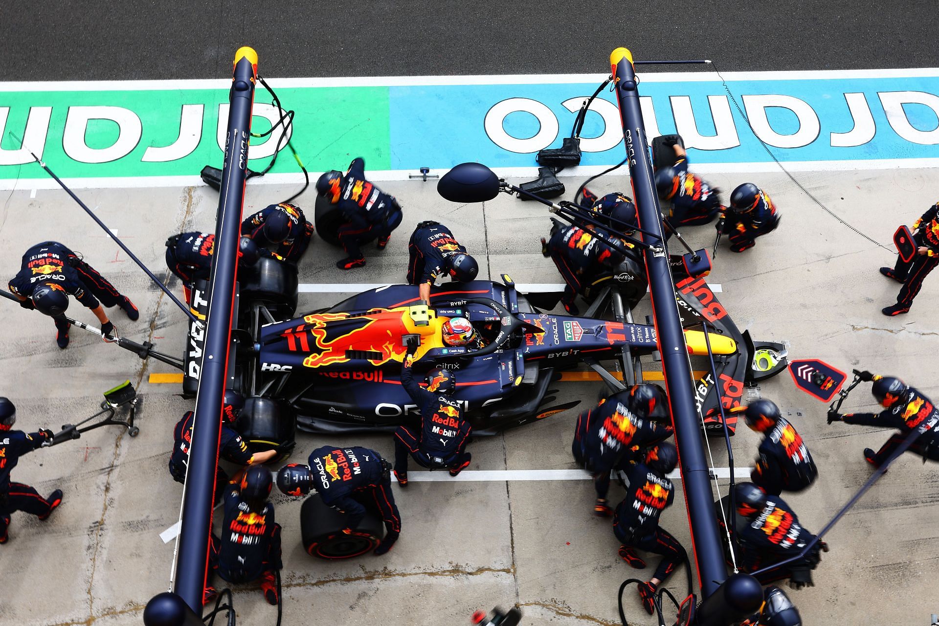 Red Bull driver Sergio Perez makes a pit stop during the 2022 F1 Hungarian GP (Photo by Mark Thompson/Getty Images)