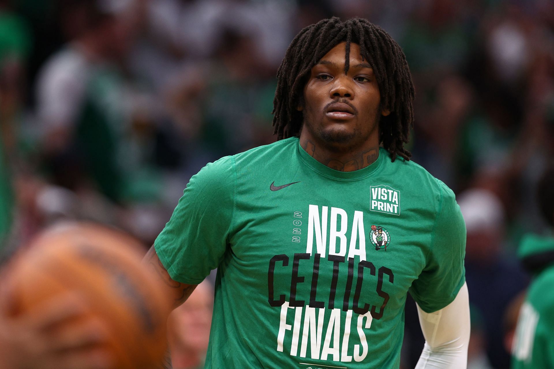 Robert Williams warms up before a game