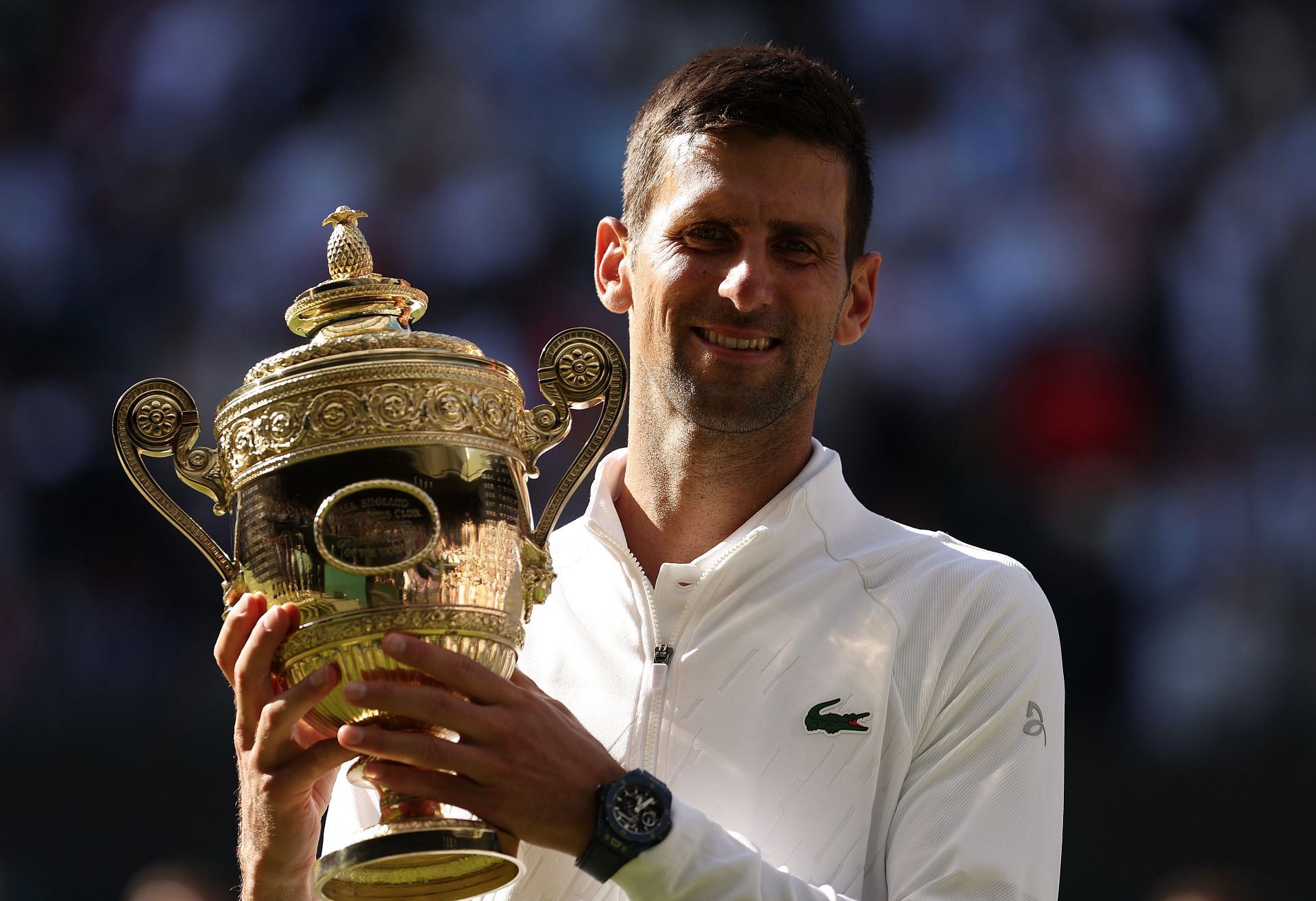 Novak Djokovic with the 2022 Wimbledon trophy