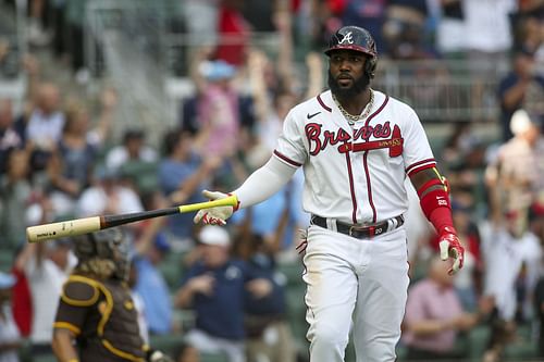 Marcell Ozuna hits a two-run home run against the San Diego Padres at Truist Park.