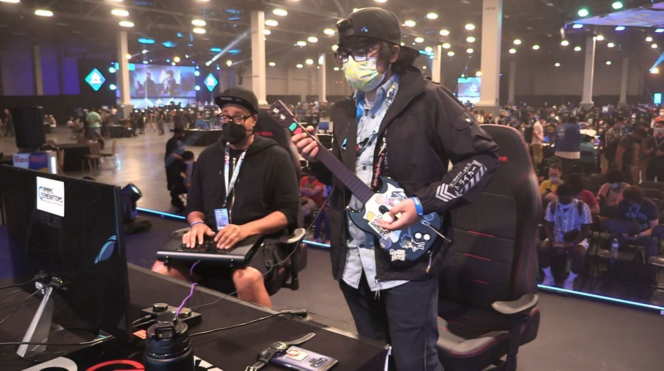 EVO 2022 saw the return of &#039;My Wife&#039;s Son&#039;, who played Melty Blood with a Guitar Hero controller (Image via EVO/Twitch)