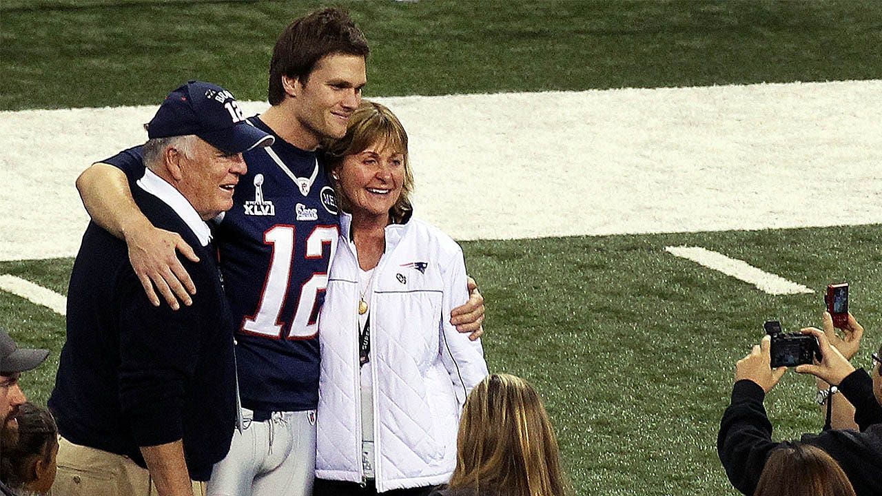 Quarterback Tom Brady with his parents
