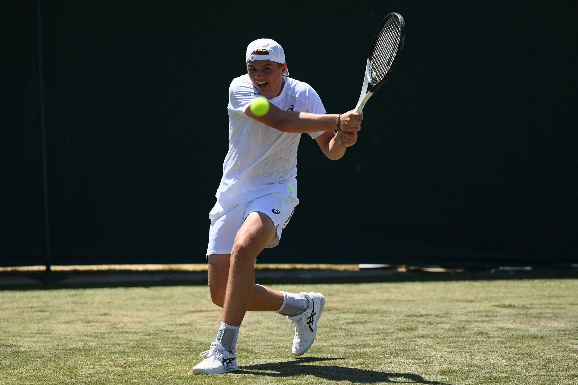 Dominic Stricker in action during the Wimbledon qualifiers