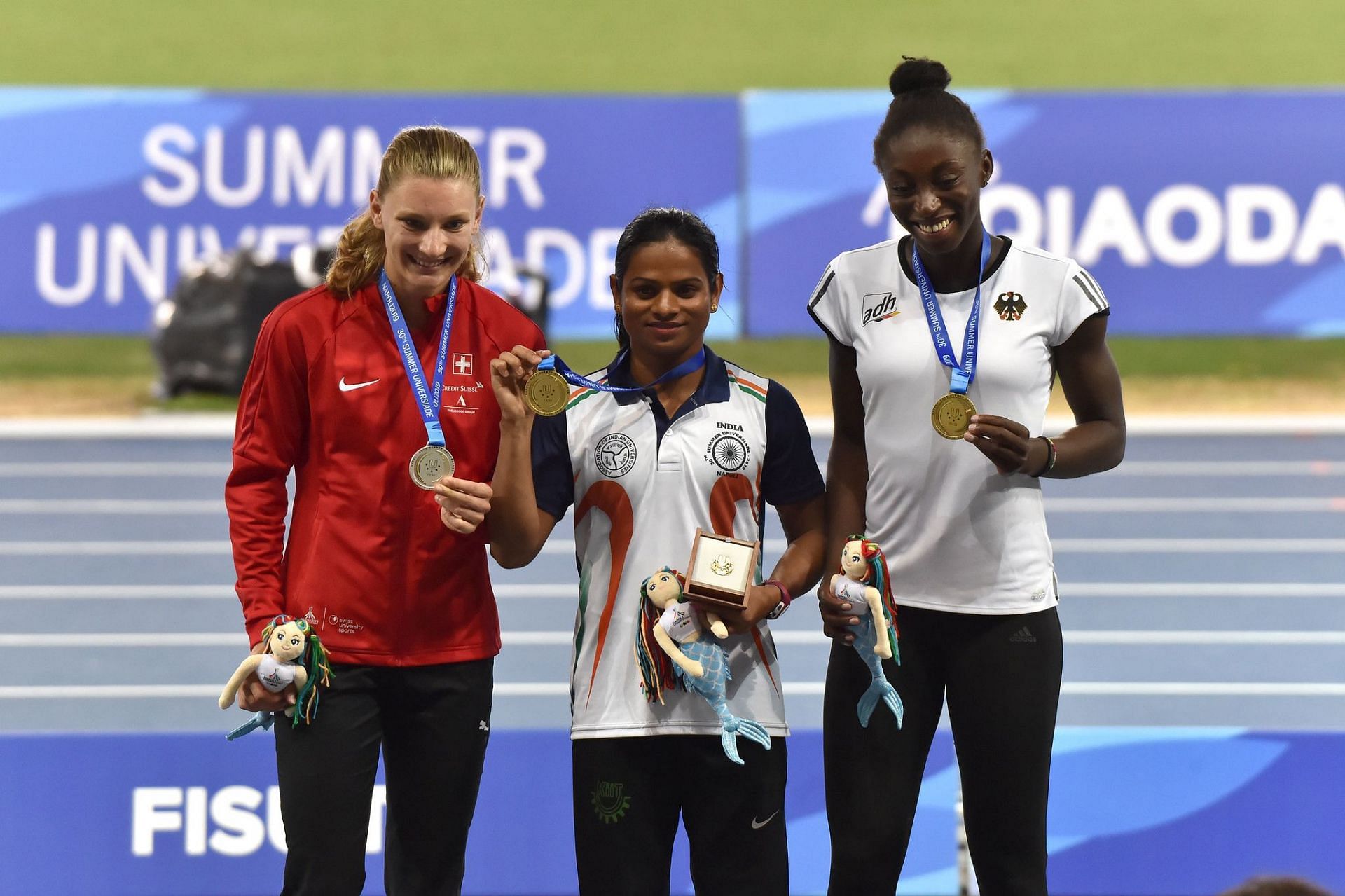 India&#039;s Dutee Chand after winning gold in the women&#039;s 100m final of the 2019 World University Games in Napoli | Image: FISU
