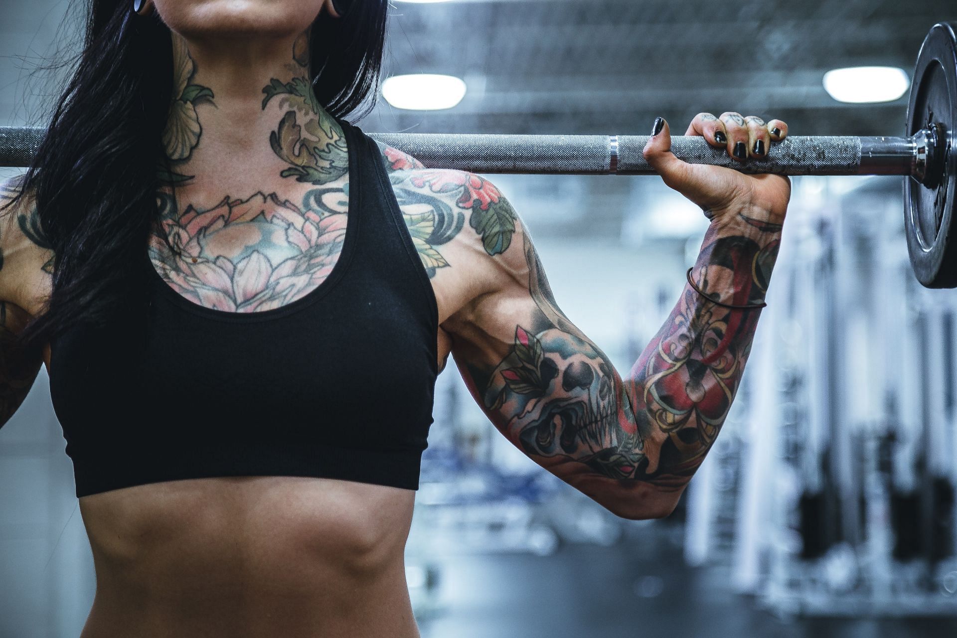 Best beginner exercises for arms using walls. (Image via Unsplash/Alora Griffiths)