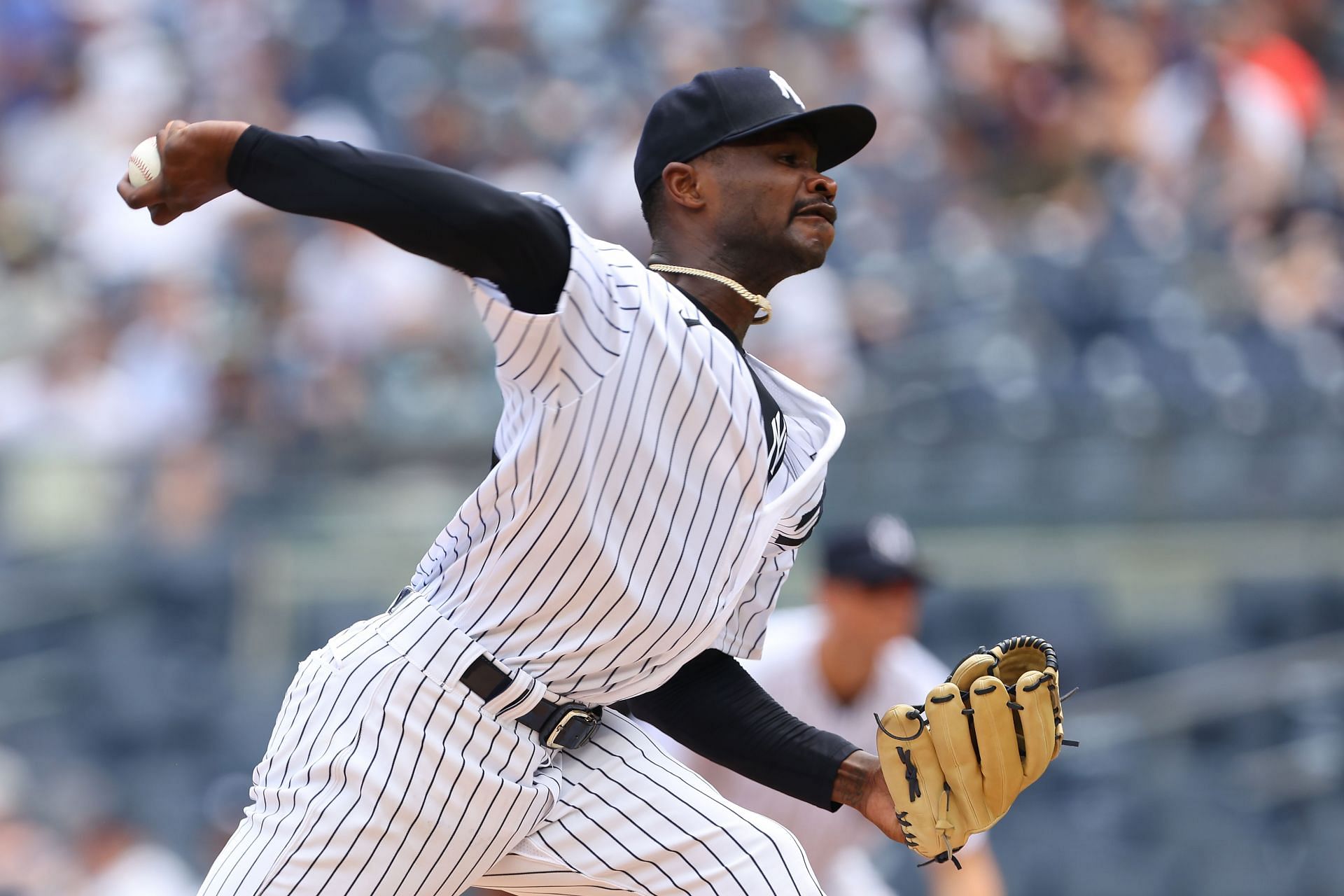 New York Yankees' pitcher Jonathan Loaisiga throws during the ninth inning  of a baseball game against the Boston Red Sox, Sunday, July 17, 2022, in  New York. The Yankees won 13-2. (AP