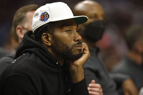 Kawhi Leonard #2 of the LA Clippers looks on from the bench during the second half of a game against the Memphis Grizzlies at Staples Center on October 23, 2021 in Los Angeles, California.