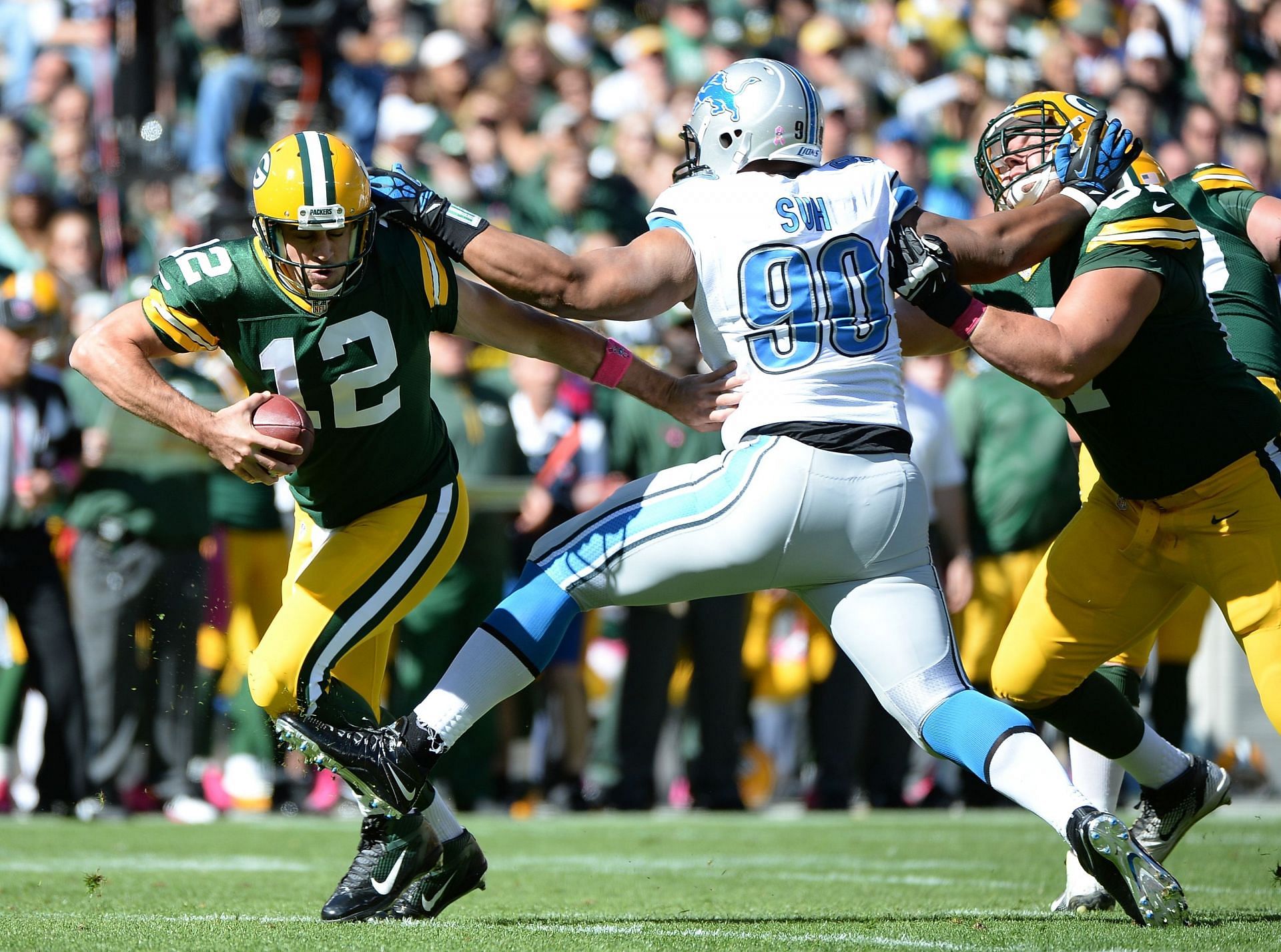 Aaron Rodgers and Ndamukong Suh