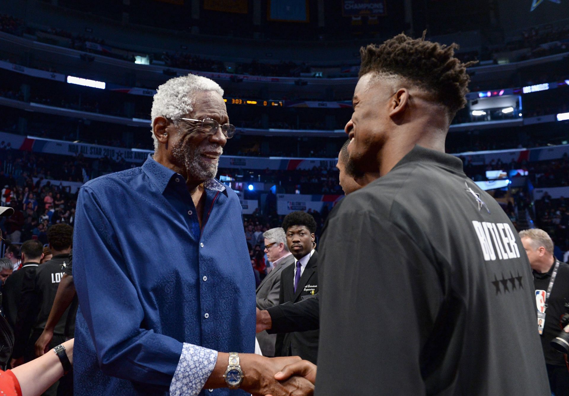 Bill Russell, left, greets Jimmy Butler at the 2018 NBA All-Star Game