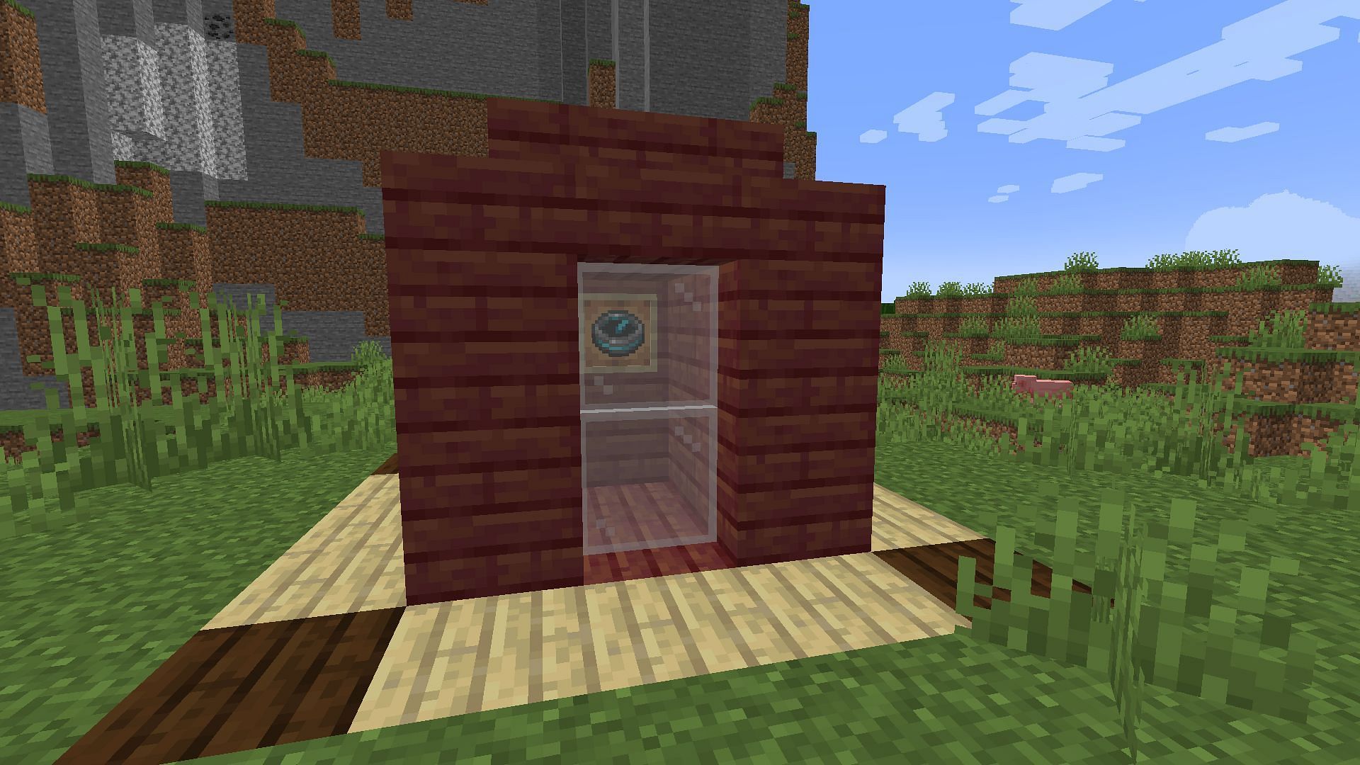 A recovery compass in a &quot;break in case of emergency&quot; case (Image via Minecraft)