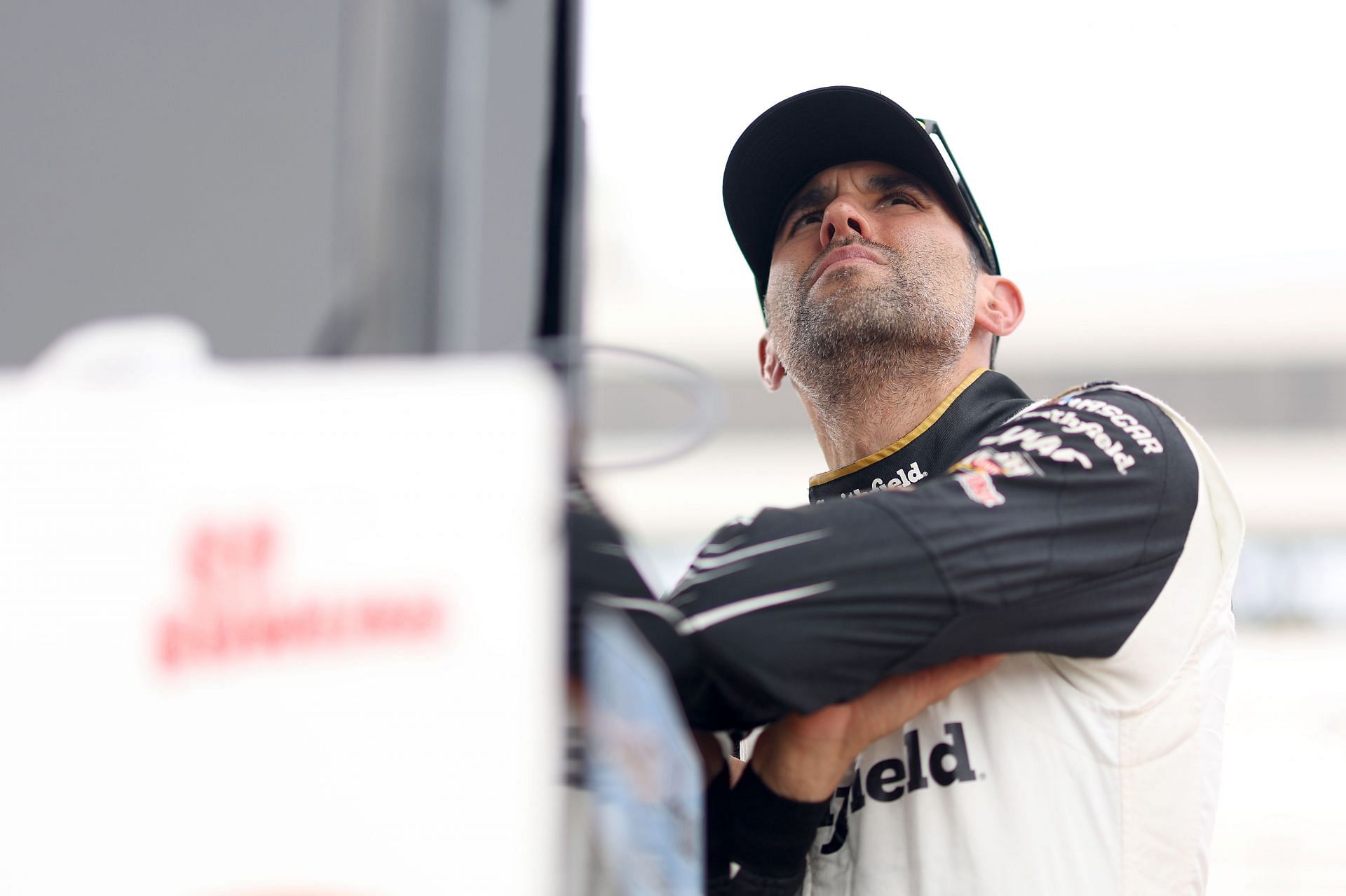 Aric Almirola looks on during practice for the NASCAR Cup Series Ambetter 301 at New Hampshire Motor Speedway