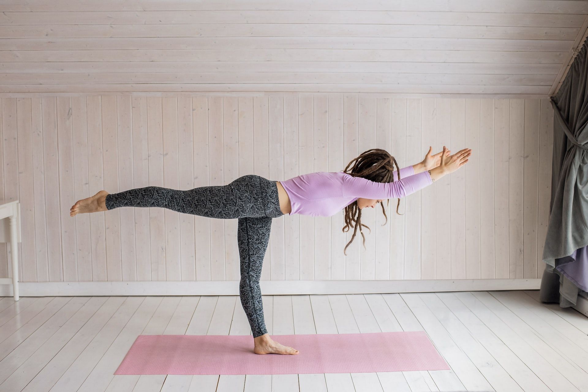 Yoga exercises can activate the glute muscles. (Photo via Pexels/ Alexy Almond)