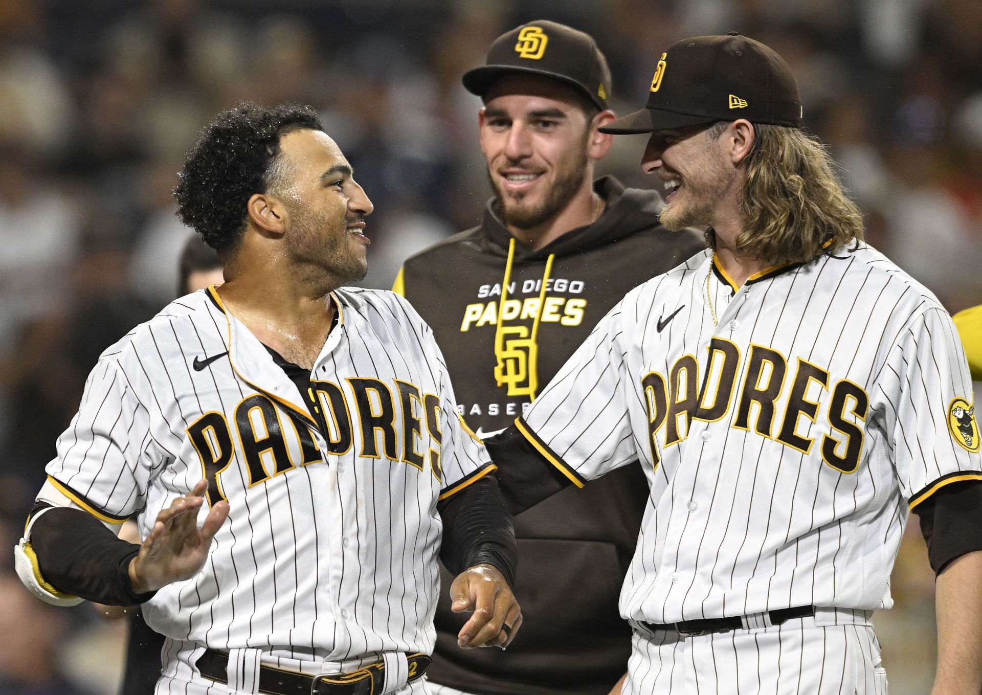 Josh Hader is greeted by teammates after the completion of a Colorado Rockies v San Diego Padres - Game Two.
