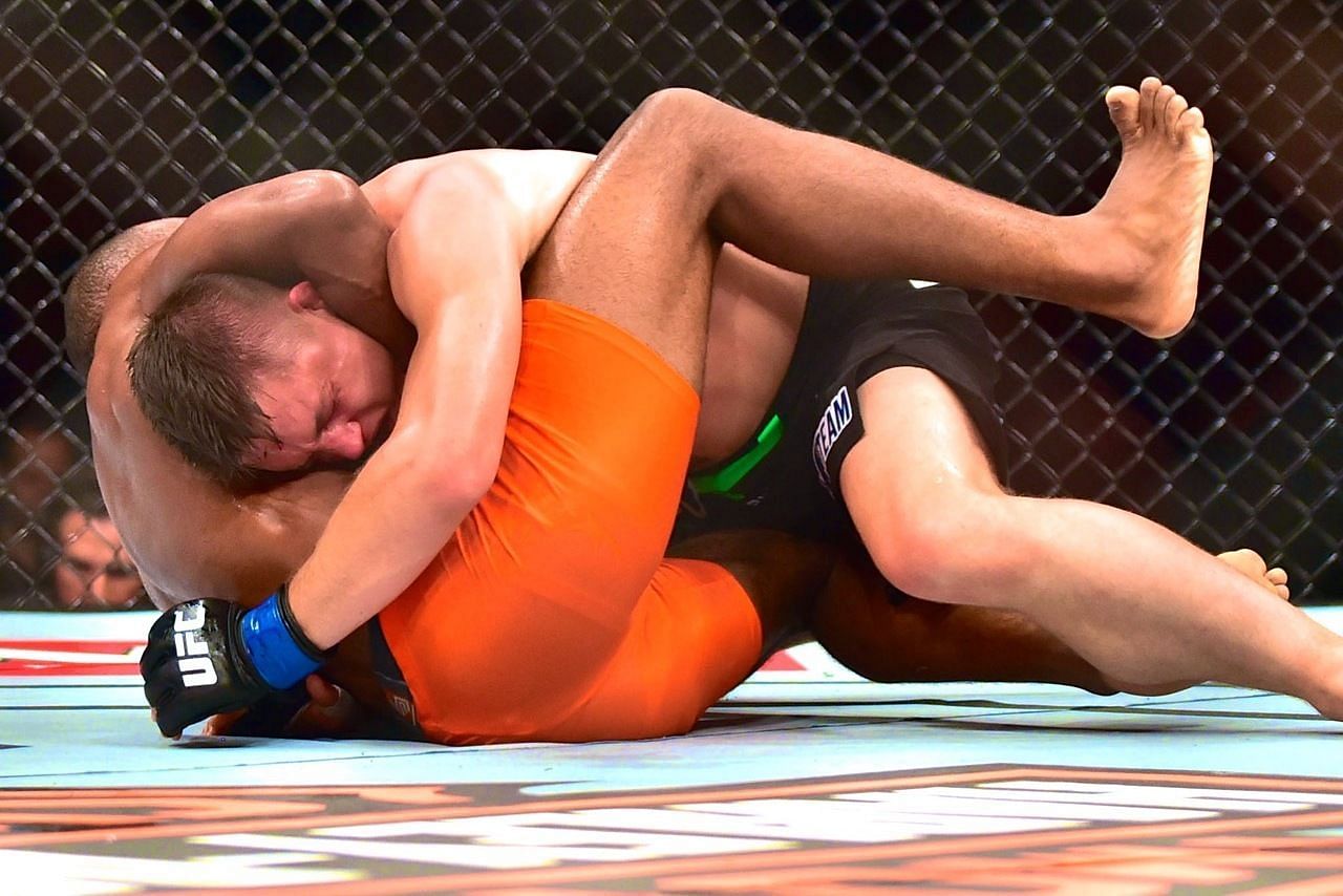 An early stoppage in the fight between Drew Dober (top) and Leandro Silva (bottom) meant that the result was overturned