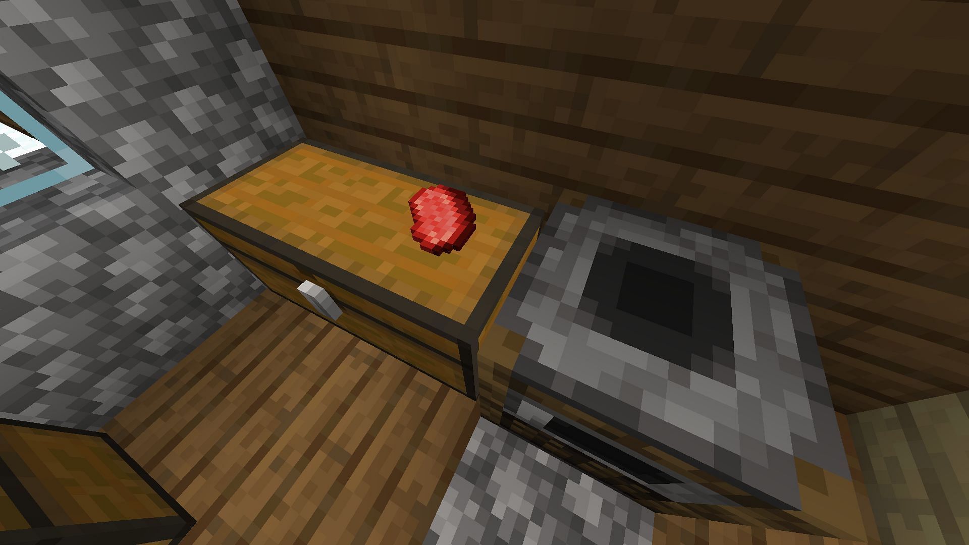 A raw steak on a chest with the help of invisible item frames in Minecraft (Image via Mojang)