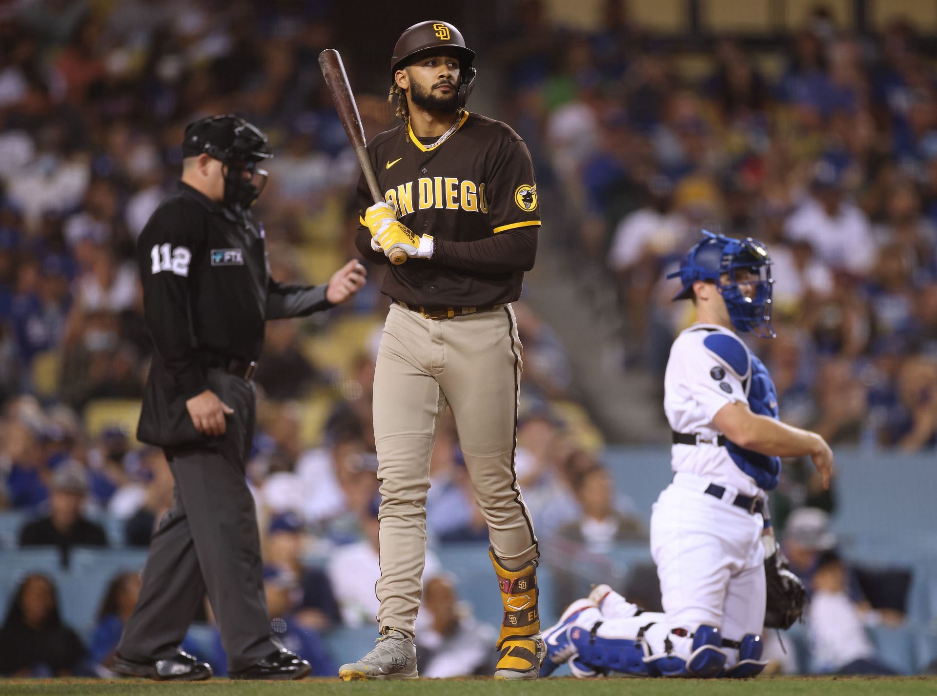 Fernando Tatis Jr. #23 of the San Diego Padres reacts to his strikeout