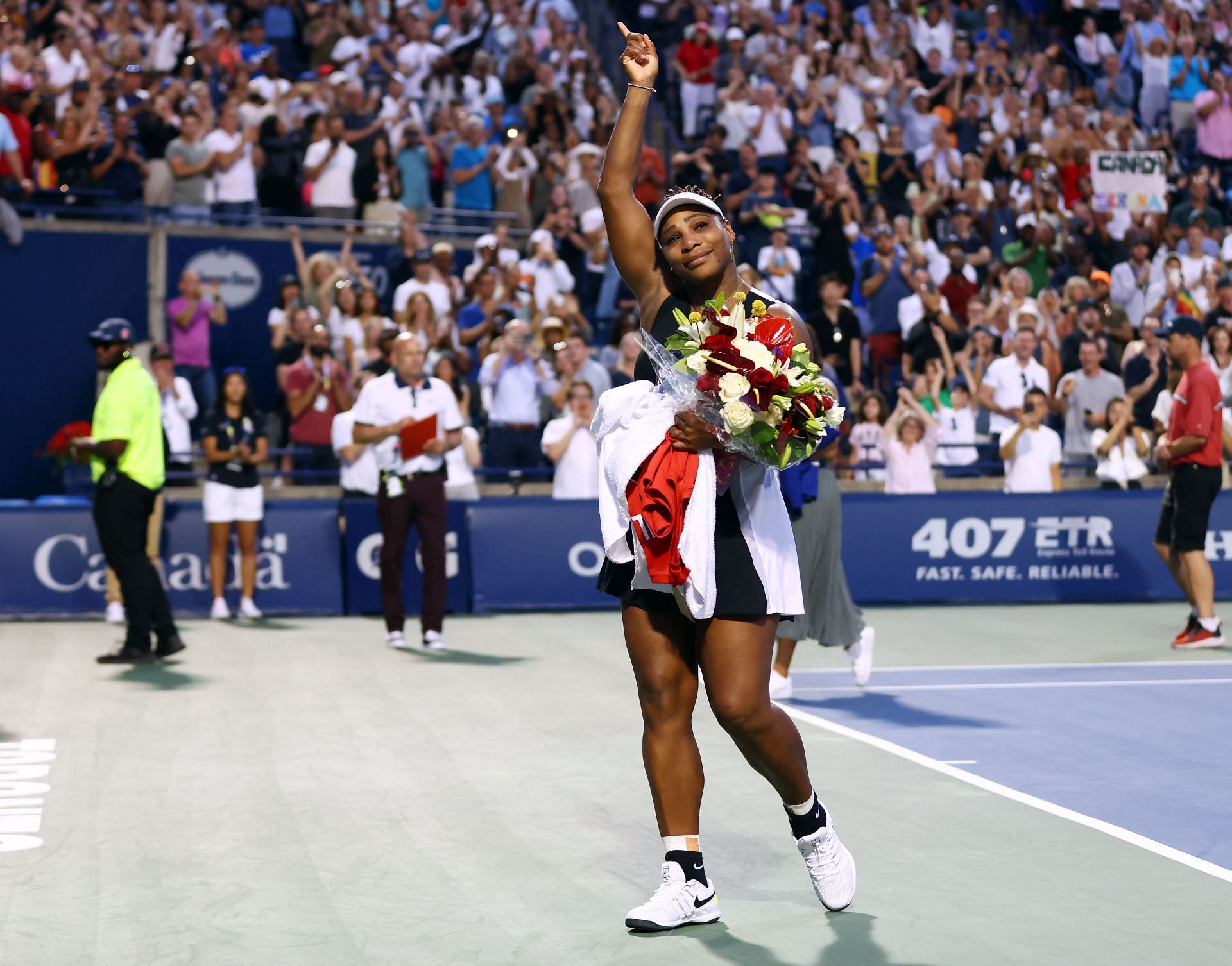 Serena Williams waves goodbye to the crowd at the 2022 Canadian Open