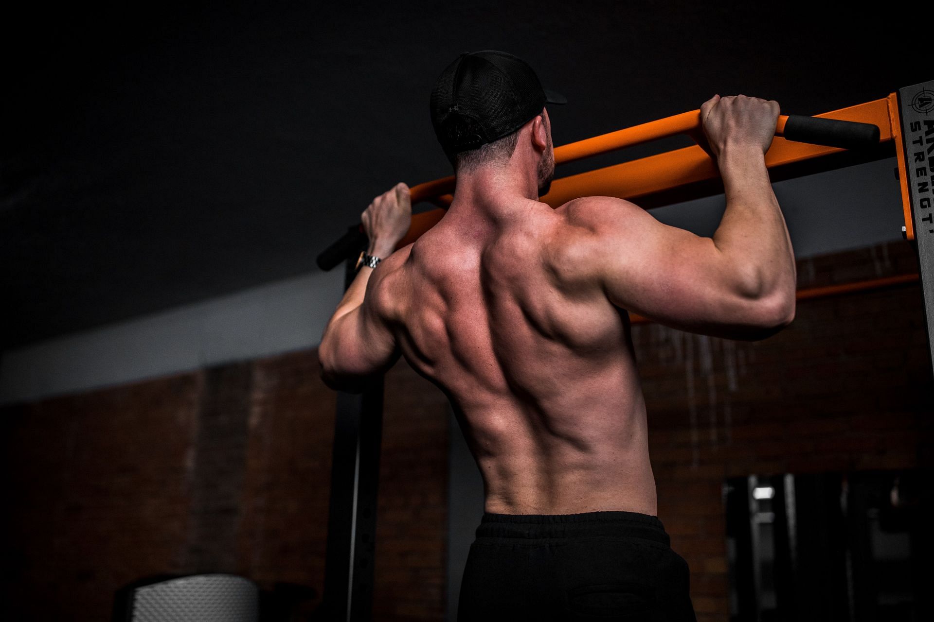 Pull-up variations activate the same muscle groups as the classic version. (Image via Unsplash/ Anastase Maragos)