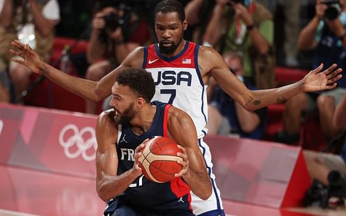 Kevin Durant defends Rudy Gobert at the 2020 Olympics.