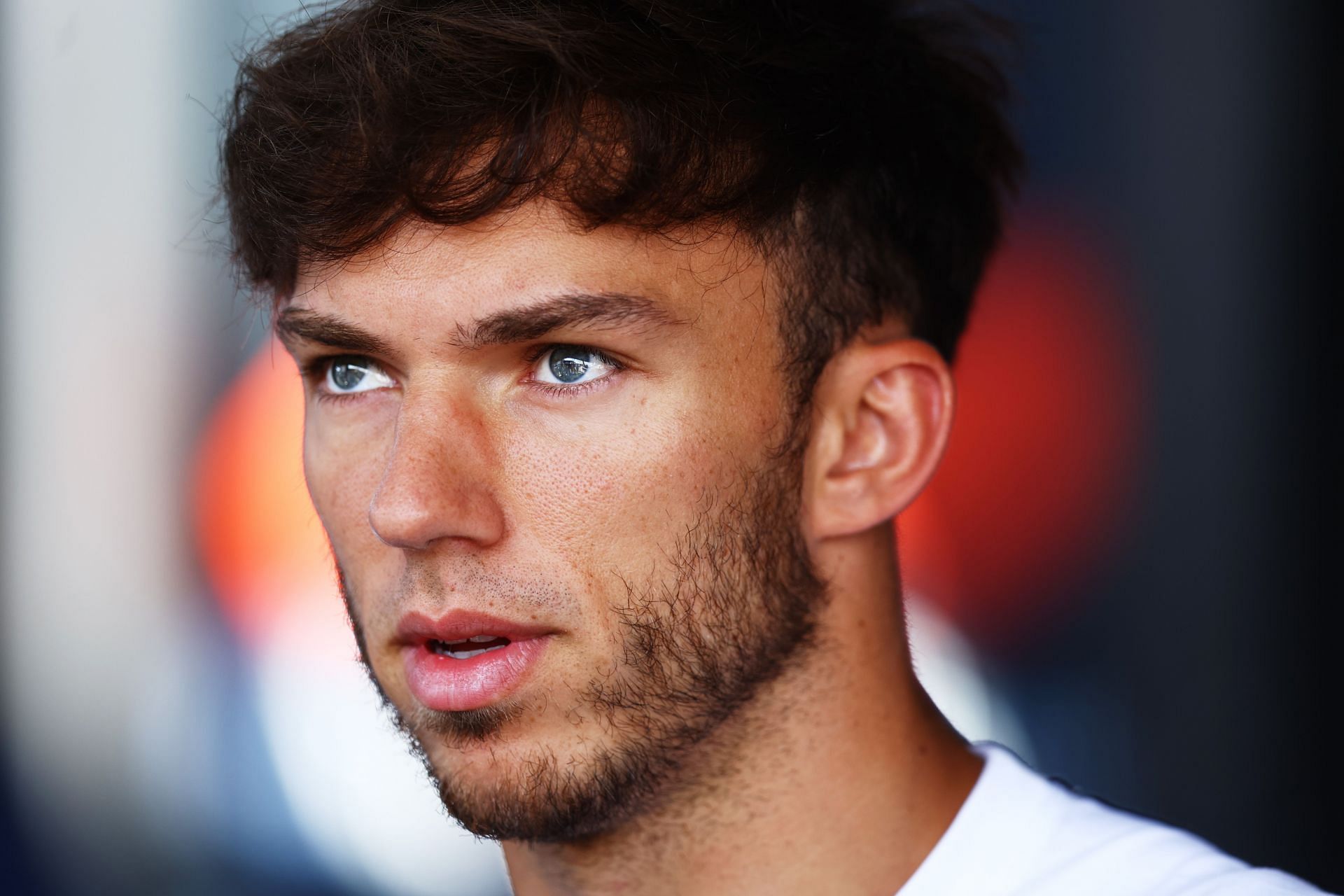 Pierre Gasly of France and Scuderia AlphaTauri talks to the media in the Paddock during previews ahead of the F1 Grand Prix of Hungary at Hungaroring on July 28, 2022 in Budapest, Hungary. (Photo by Francois Nel/Getty Images) Enter caption