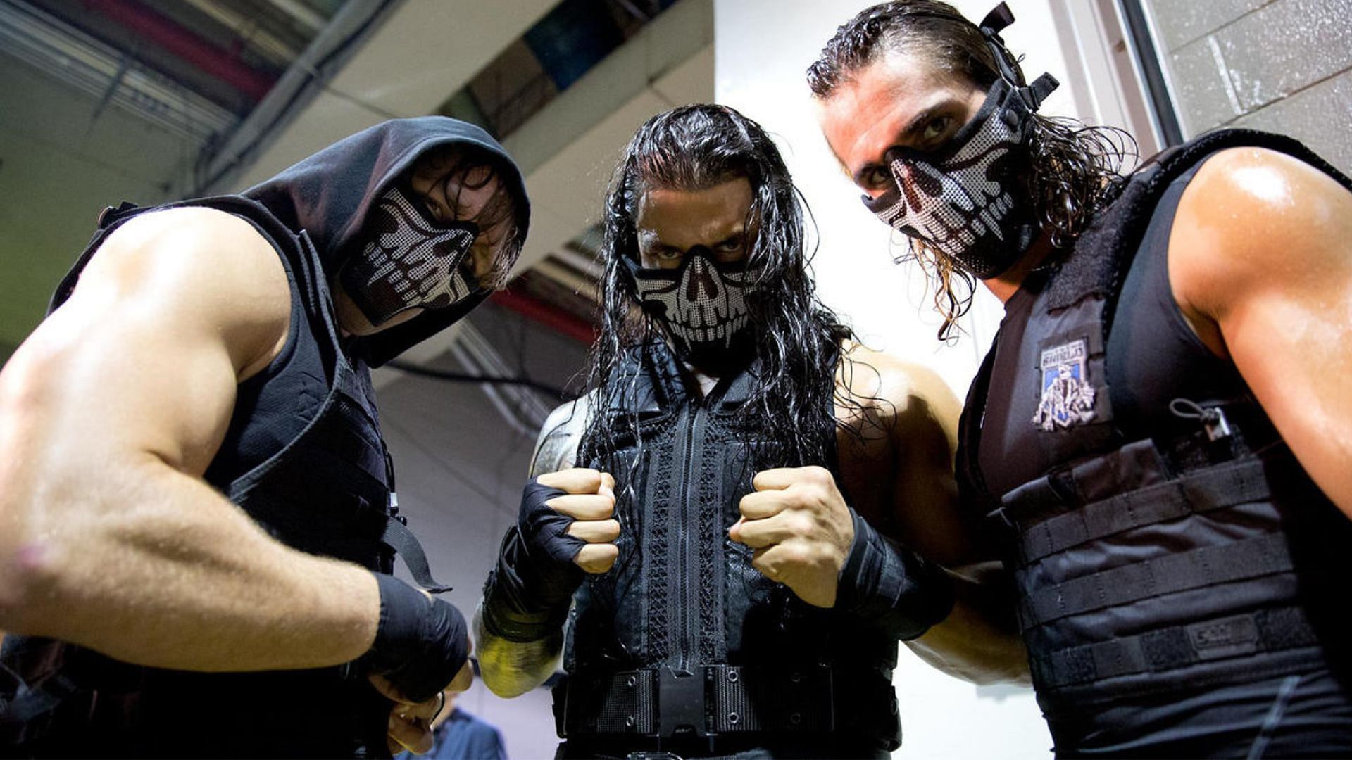 The Shield (From L to R): Dean Ambrose, Roman Reigns, and Seth Rollins