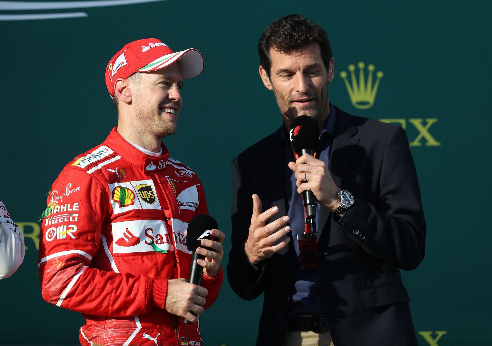 Sebastian Vettel (left) and Mark Webber (right) on the podium during the Australian Formula One Grand Prix at Albert Park on March 26, 2017, in Melbourne, Australia. (Photo by Robert Cianflone/Getty Images)