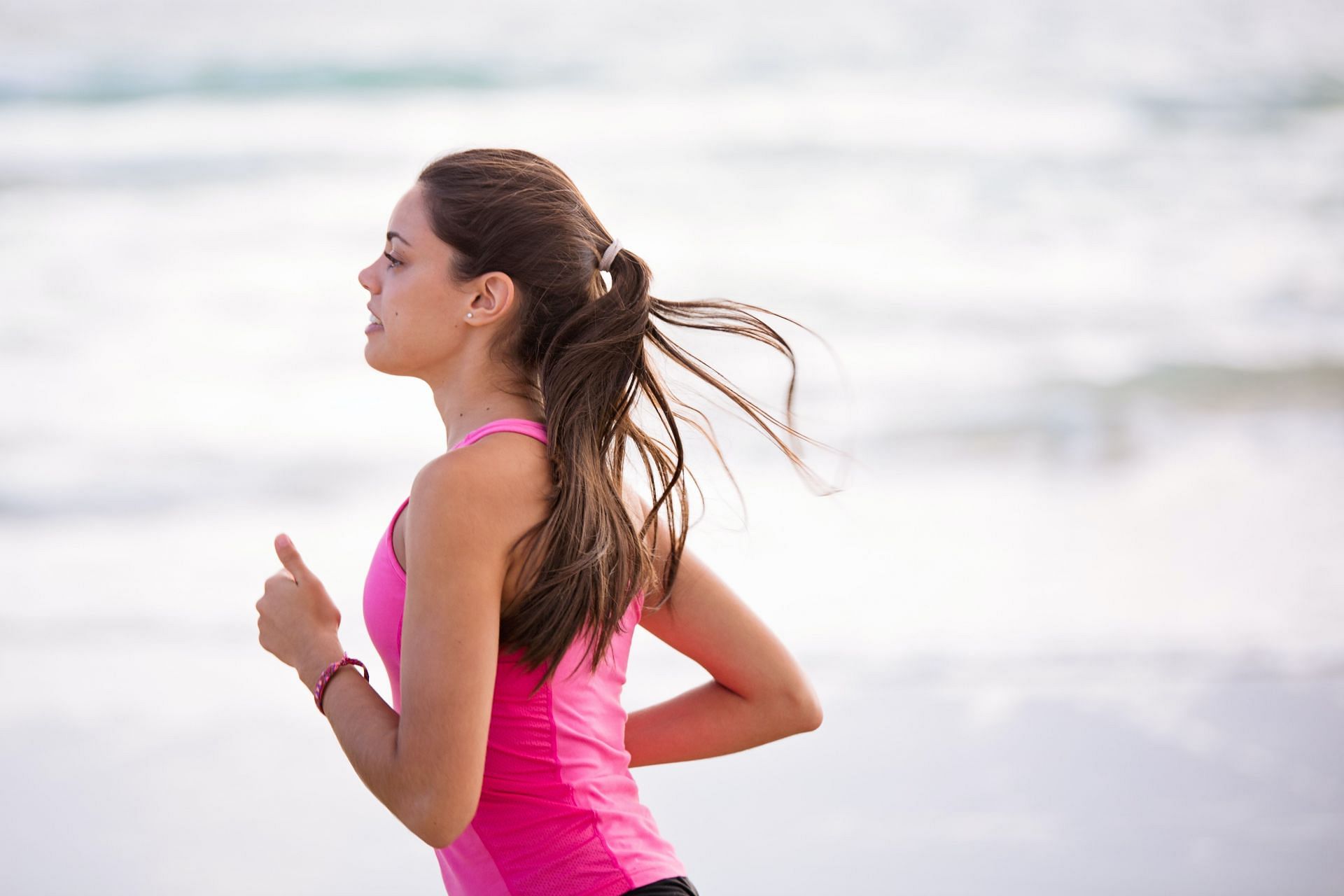 Running is a great way to boost your metabolism. (Image via Pexels/Nathan Cowley)